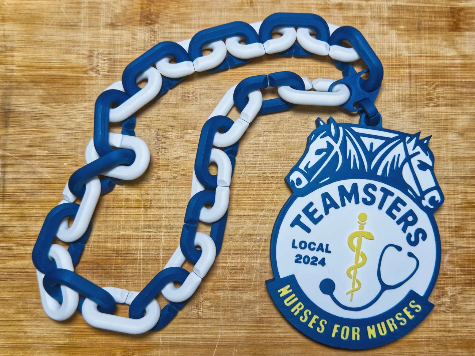 teamsters-2024-nurses-for-nurses-swag-blue-white-chain.webp