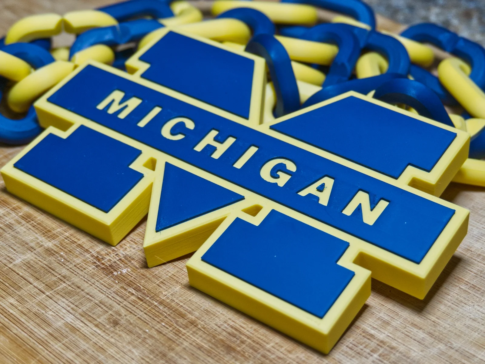 university-of-michigan-u-of-m-rally-chain-pendant-close-wolverines-go-blue.webp
