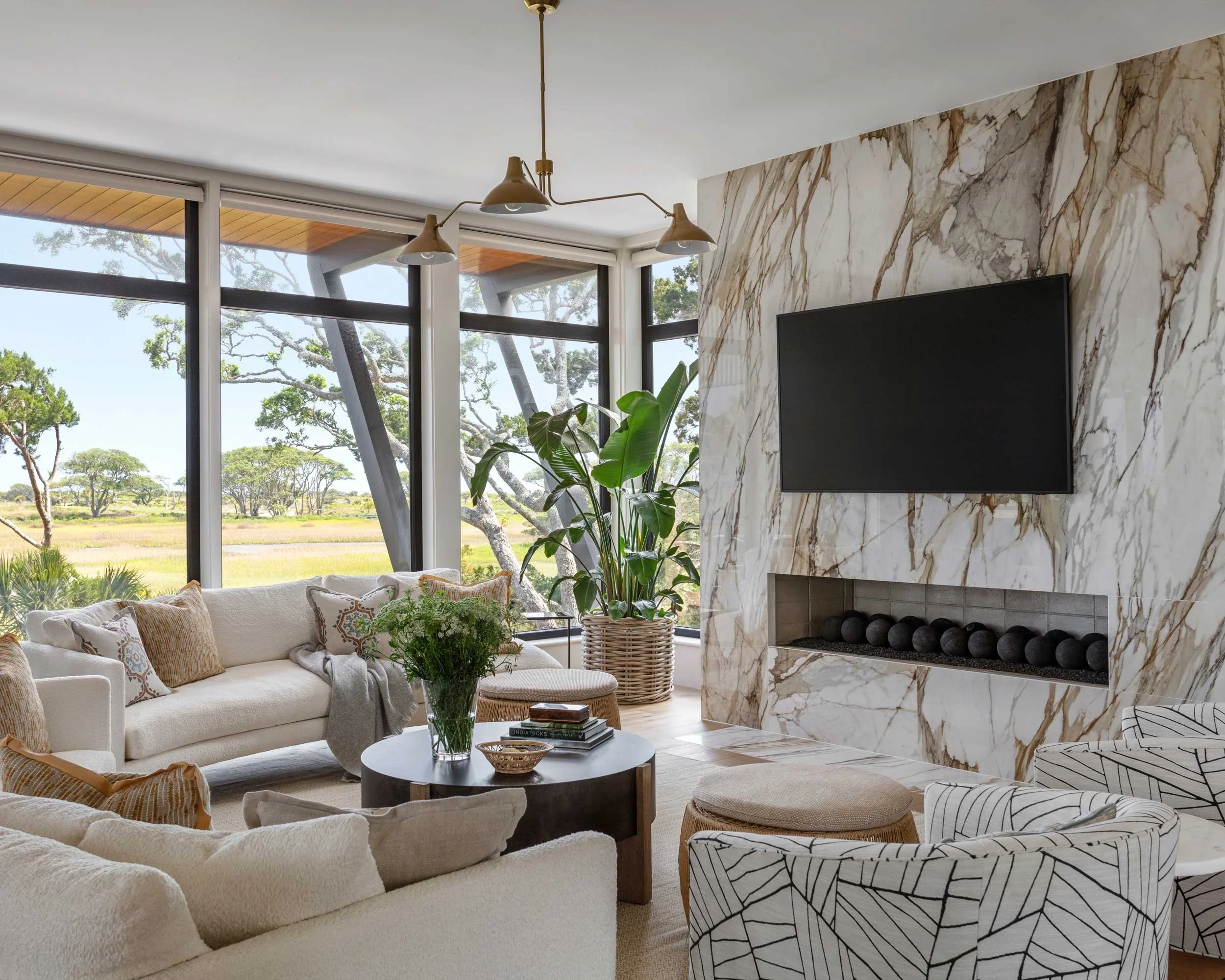 living-room-featuring-modern-fireplace-with-matching-thayer-coggin-slice-sofas.jpg