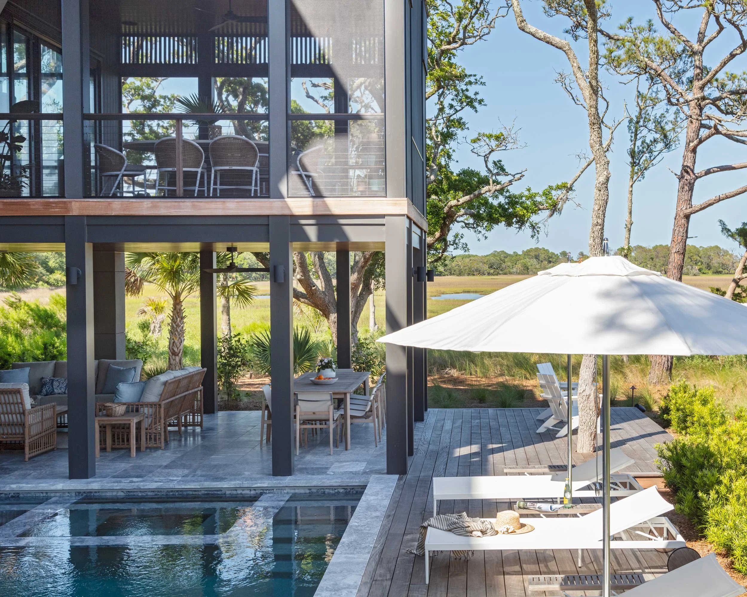 multiple-poolside-seating-dining-areas-overlooking-the-kiawah-island-marsh.jpg
