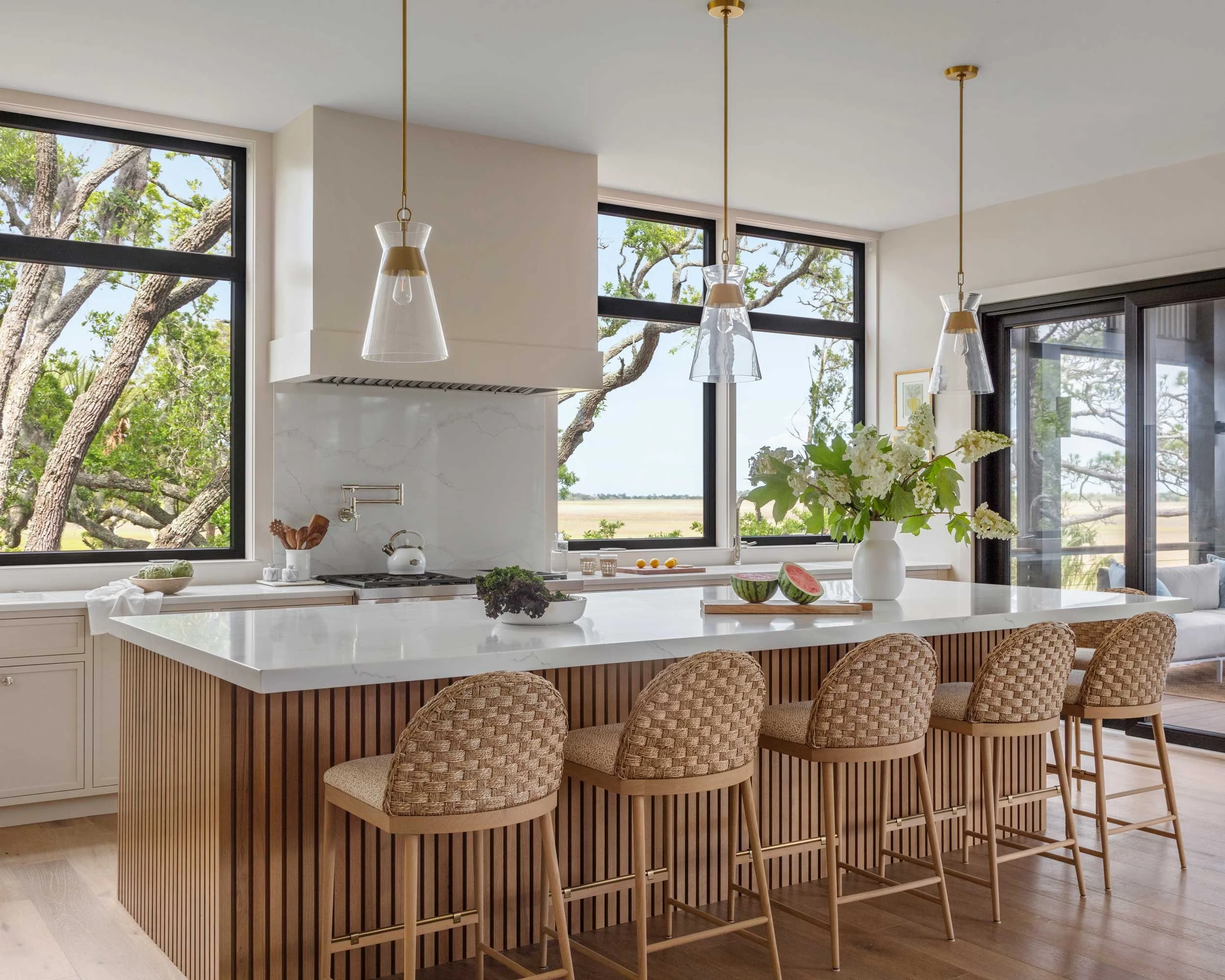 mcgee-and-company-thatch-pattern-barstools-line-backside-of-kitchen-island.jpg
