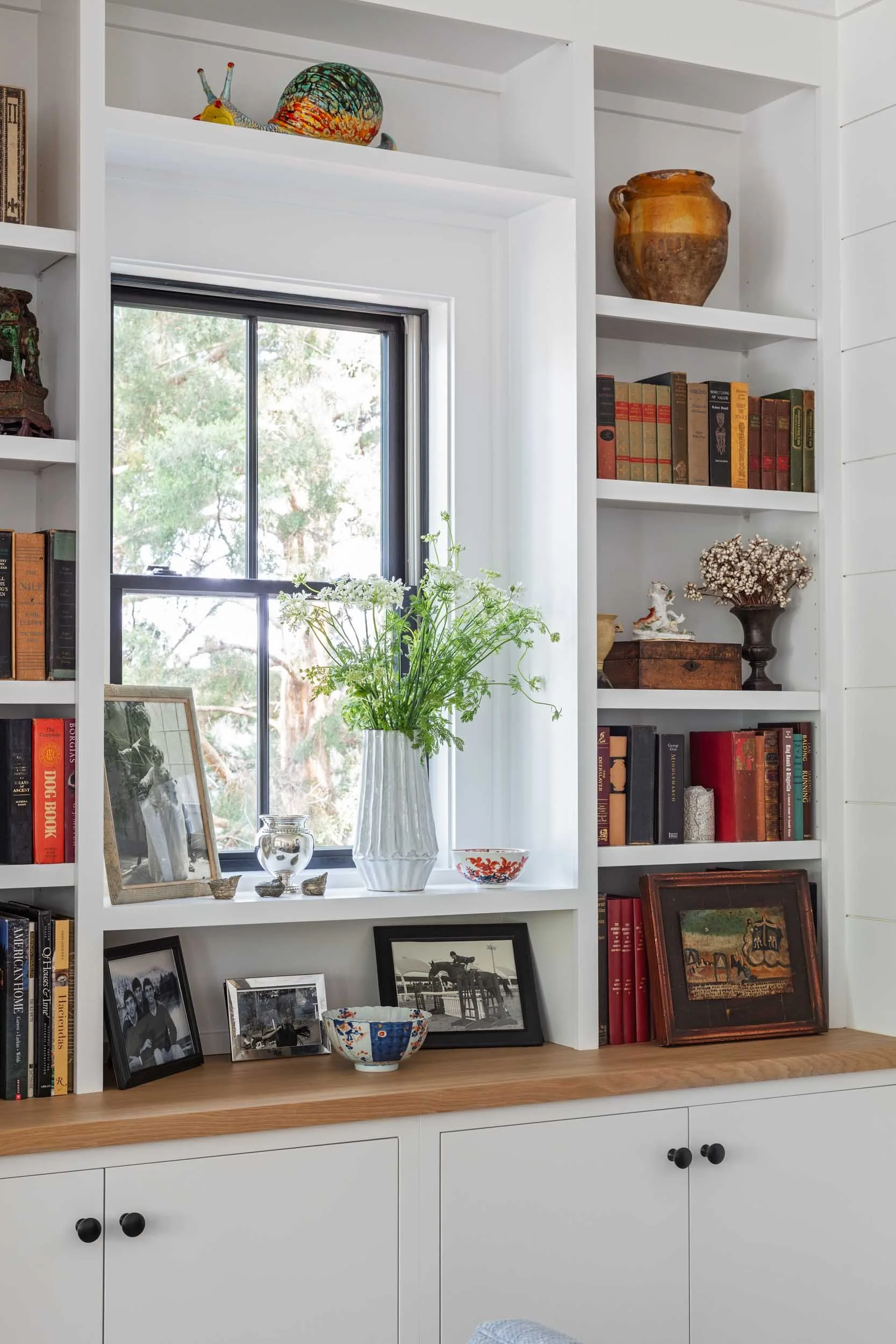 custom-shelves-filled-with-owners-personal-items.jpg
