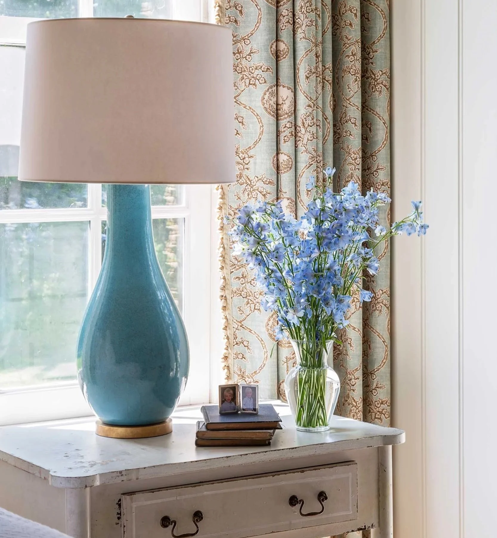 side-table-toile-curtains-blue-ceramic-lamp.jpg