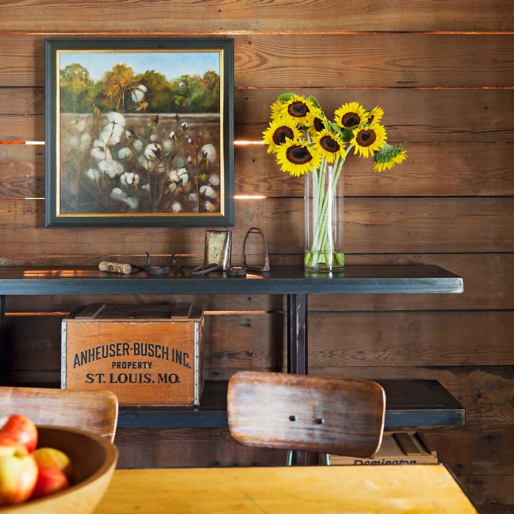 rustic-wood-paneling-with-metal-shelving-and-cotton-oil-painting.jpg