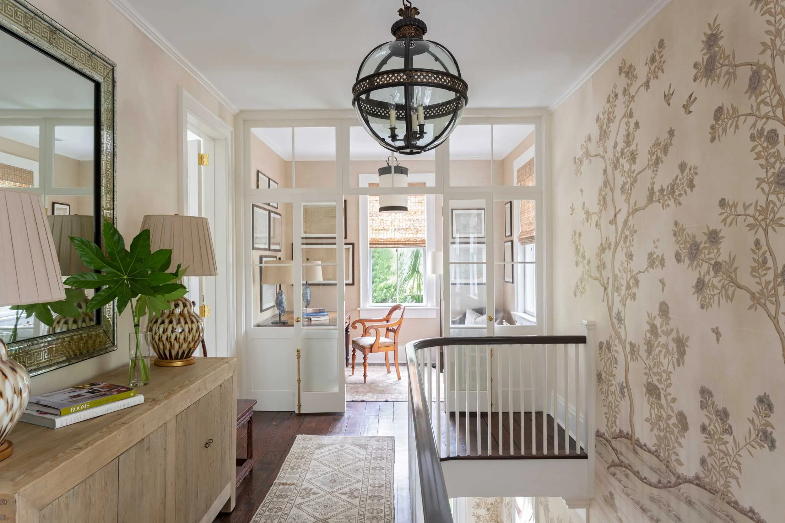historic-charleston-residence-second-floor-hallway-opens-into-home-office.jpg