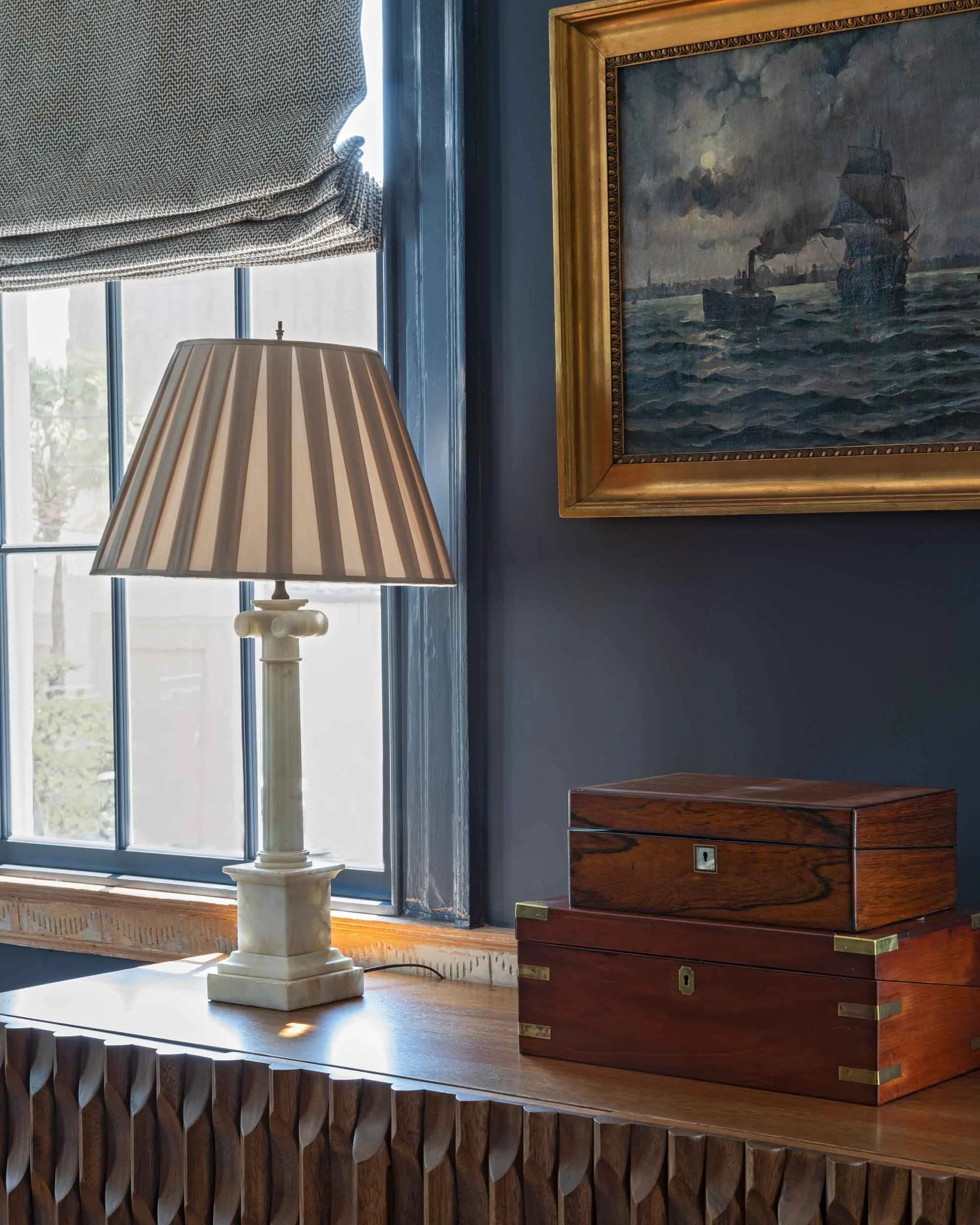 vintage-nautical-oil-painting-modern-credenza-alabaster-lamp.jpg