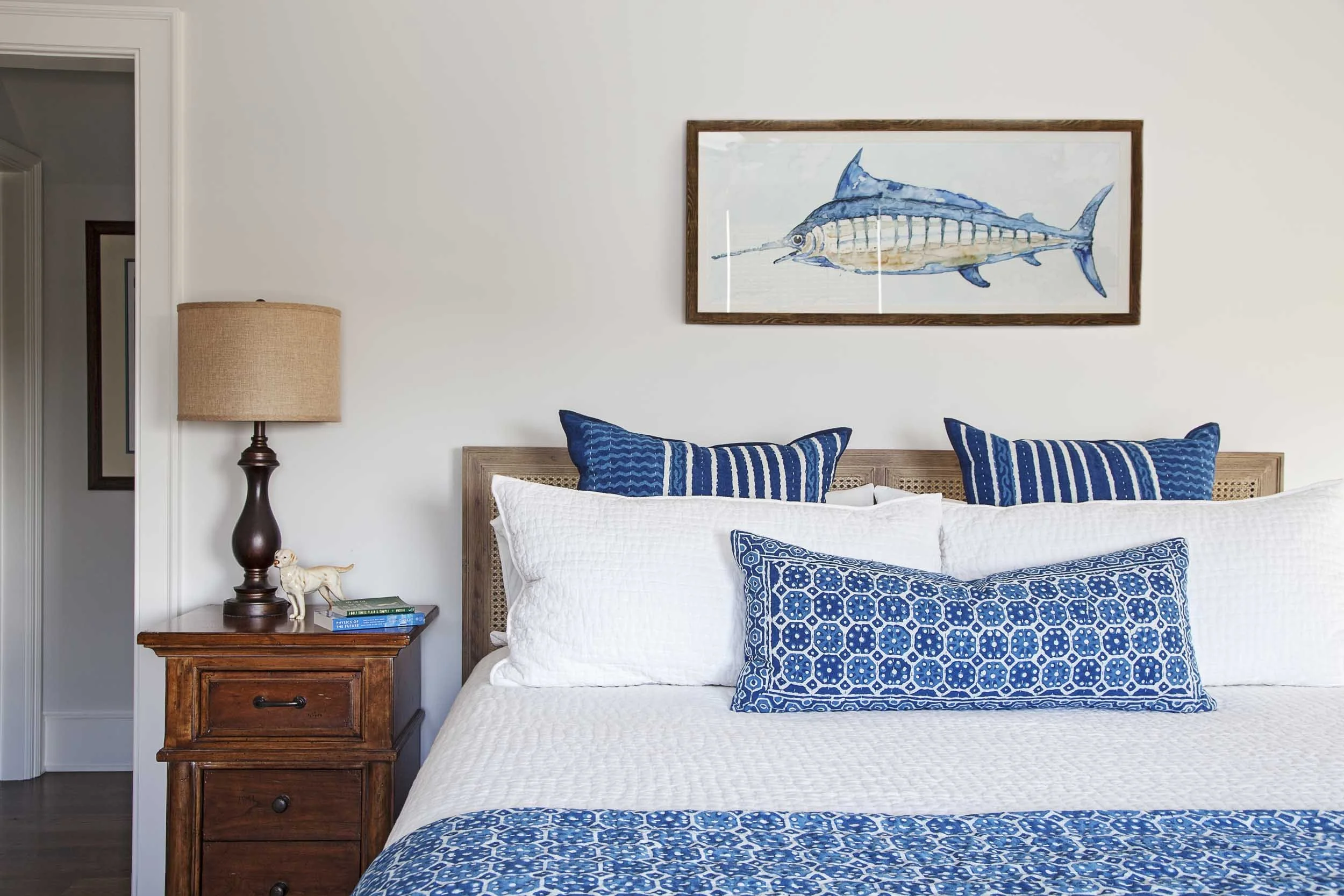 guest-bedroom-with-vintage-fish-painting.jpg