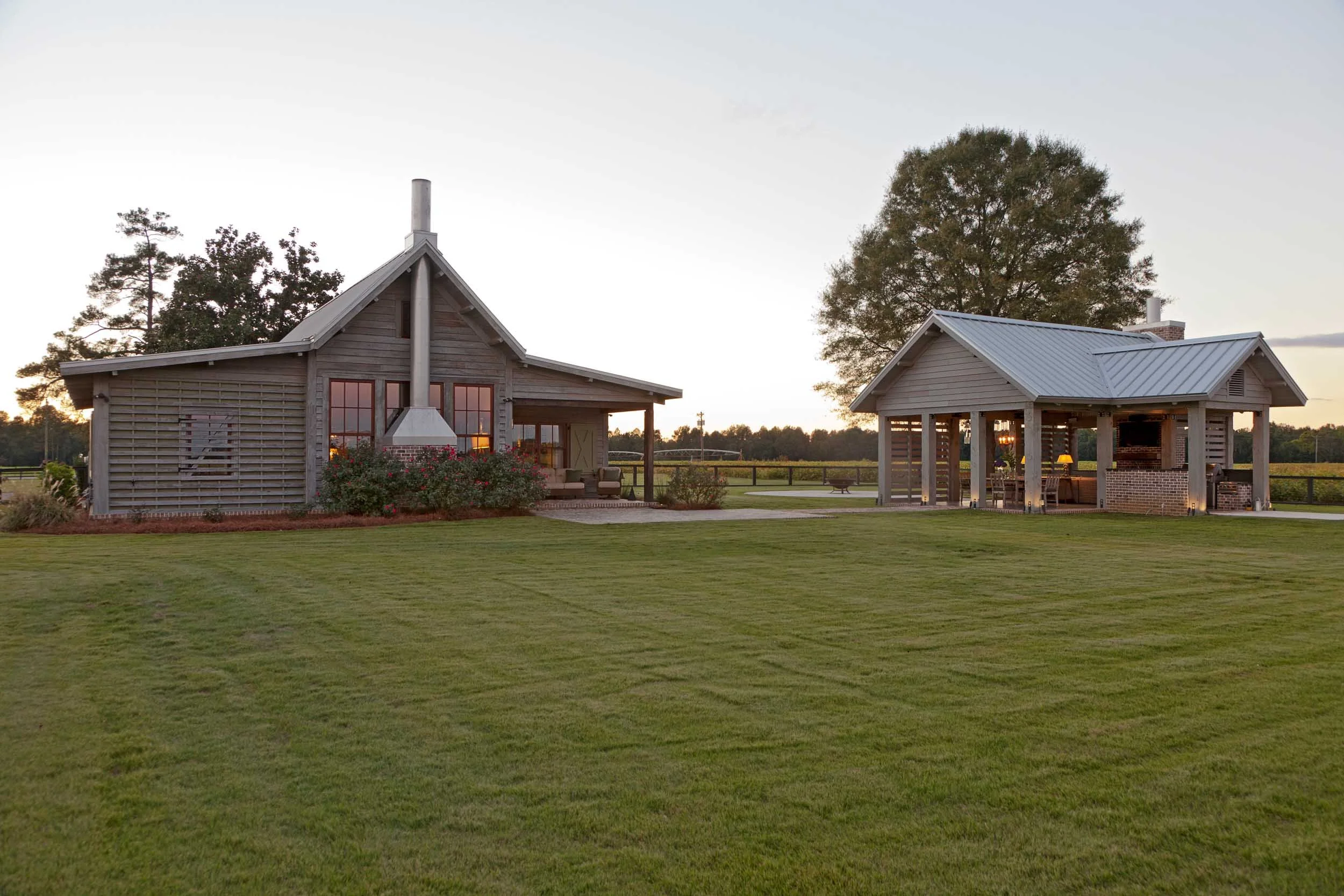 rustic-house-with-covered-patio-and-gazebo-with-paved-brick-walkway.jpg