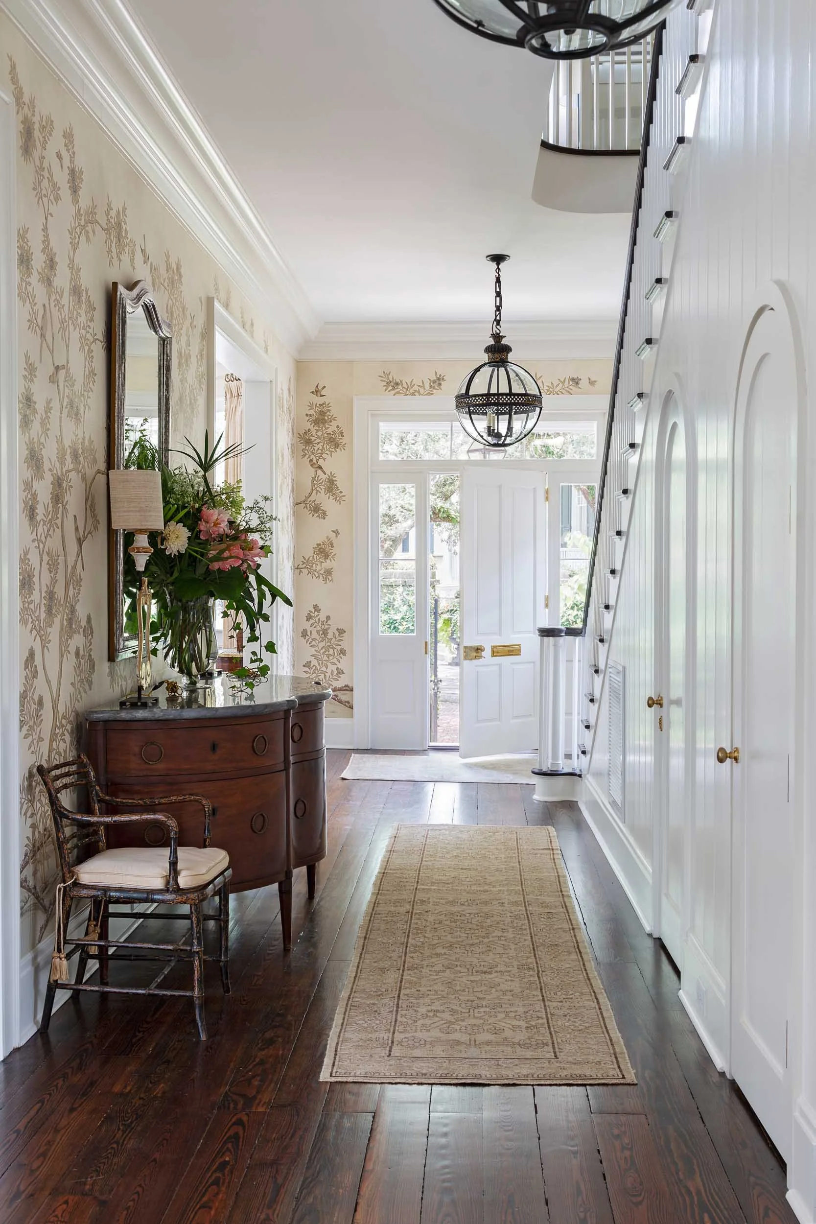 entry-way-featuring-antique-serpentine-console-table-with-marble-top.jpg
