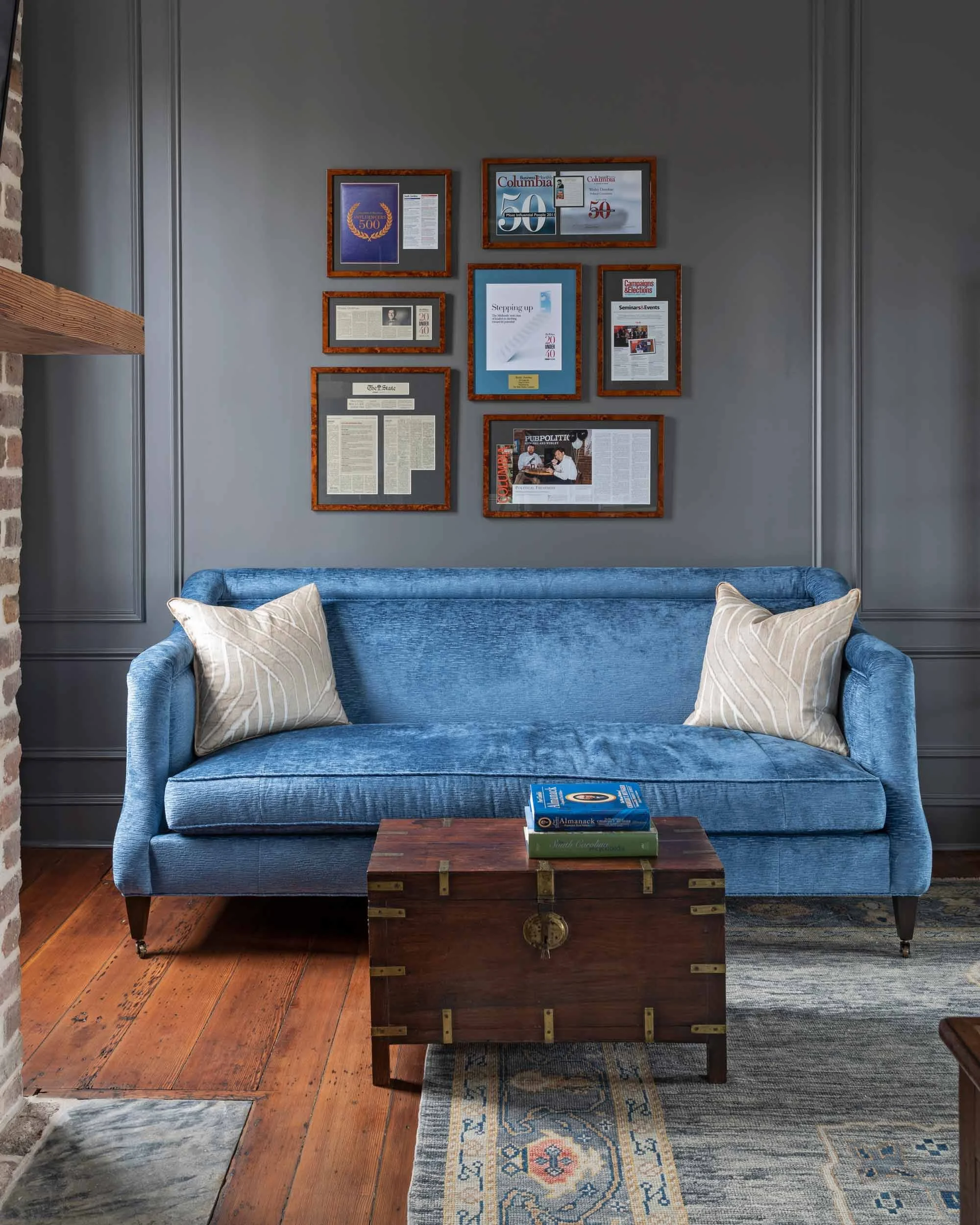 blue-velvet-sofa-antique-campaign-chest.jpg