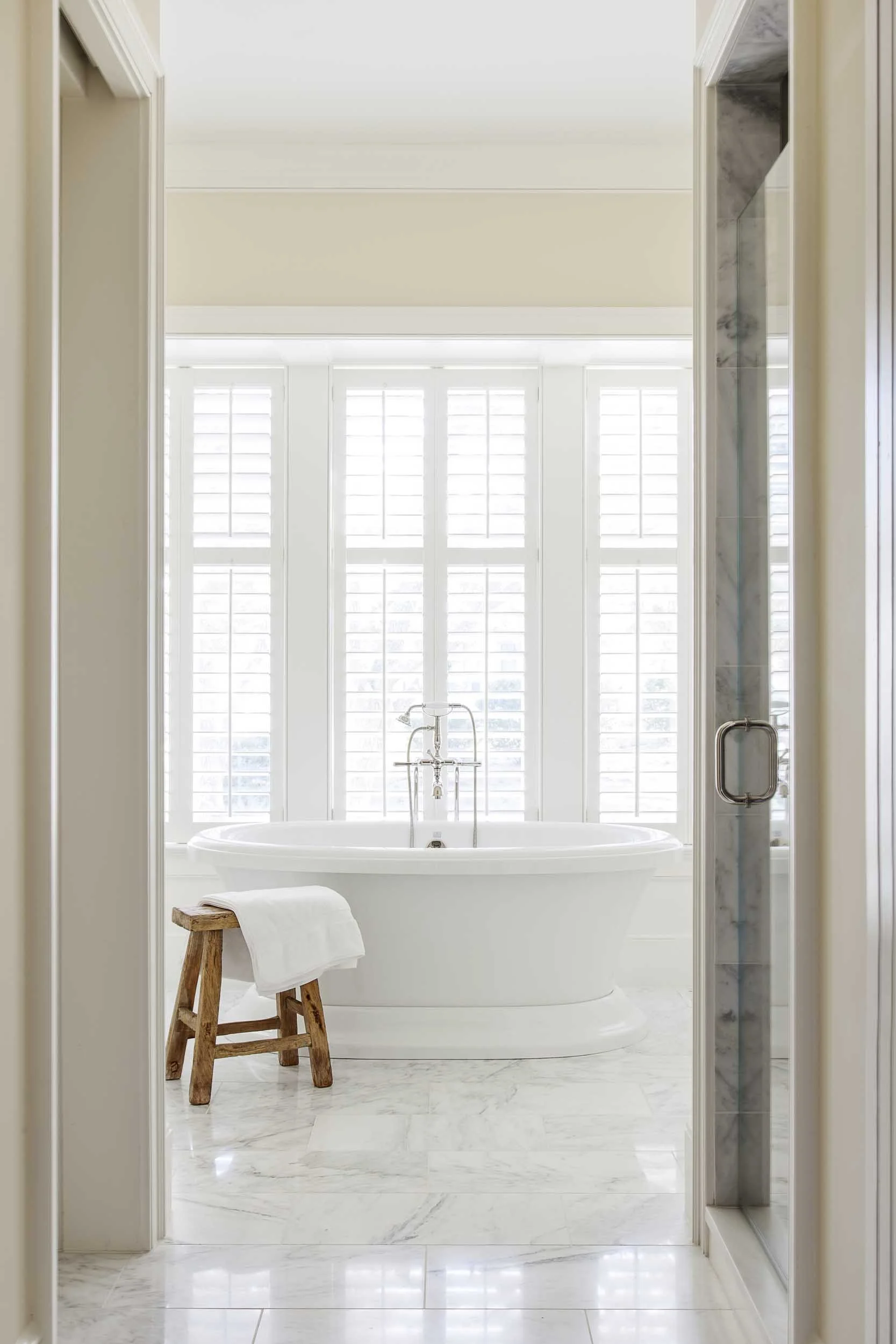 white-marble-master-bathroom-with-free-standing-bathtub.jpg