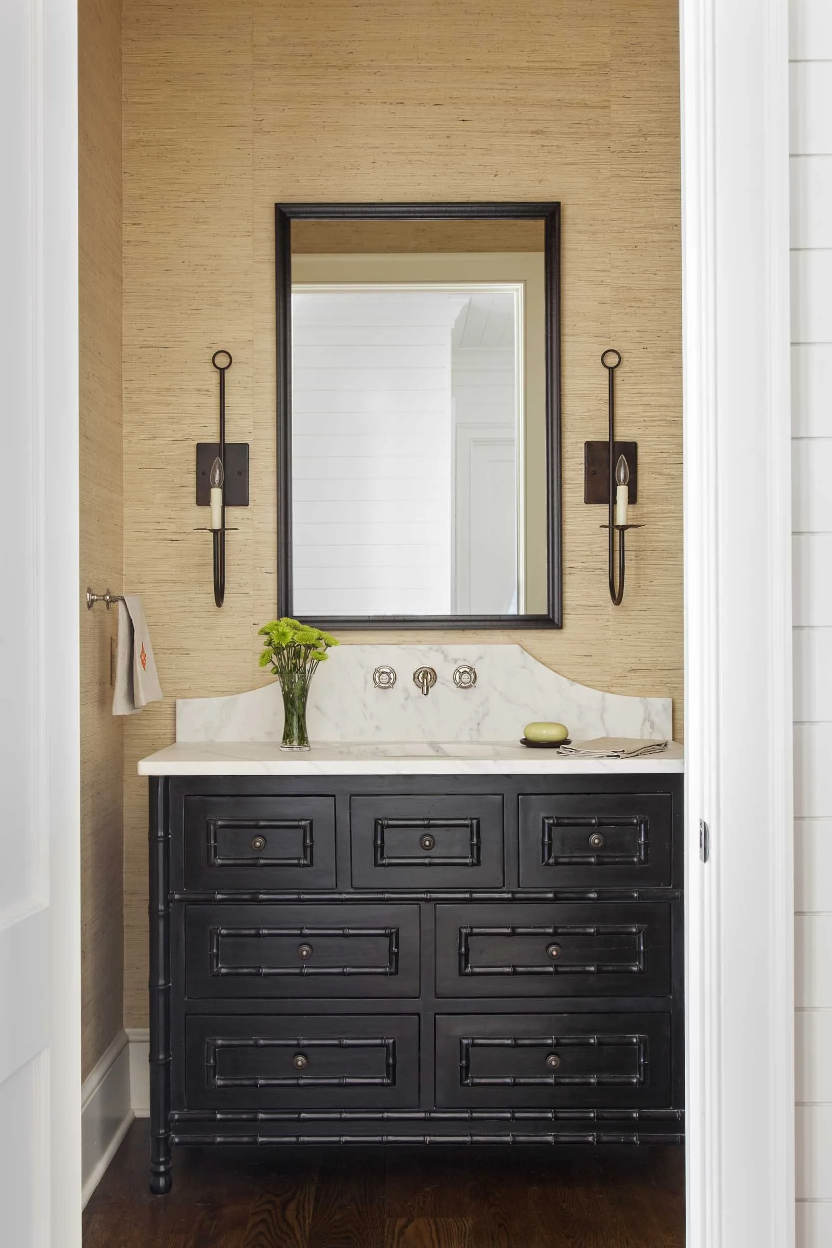 grass-cloth-wallpapered-powder-room-with-bamboo-inspired-vanity.jpg