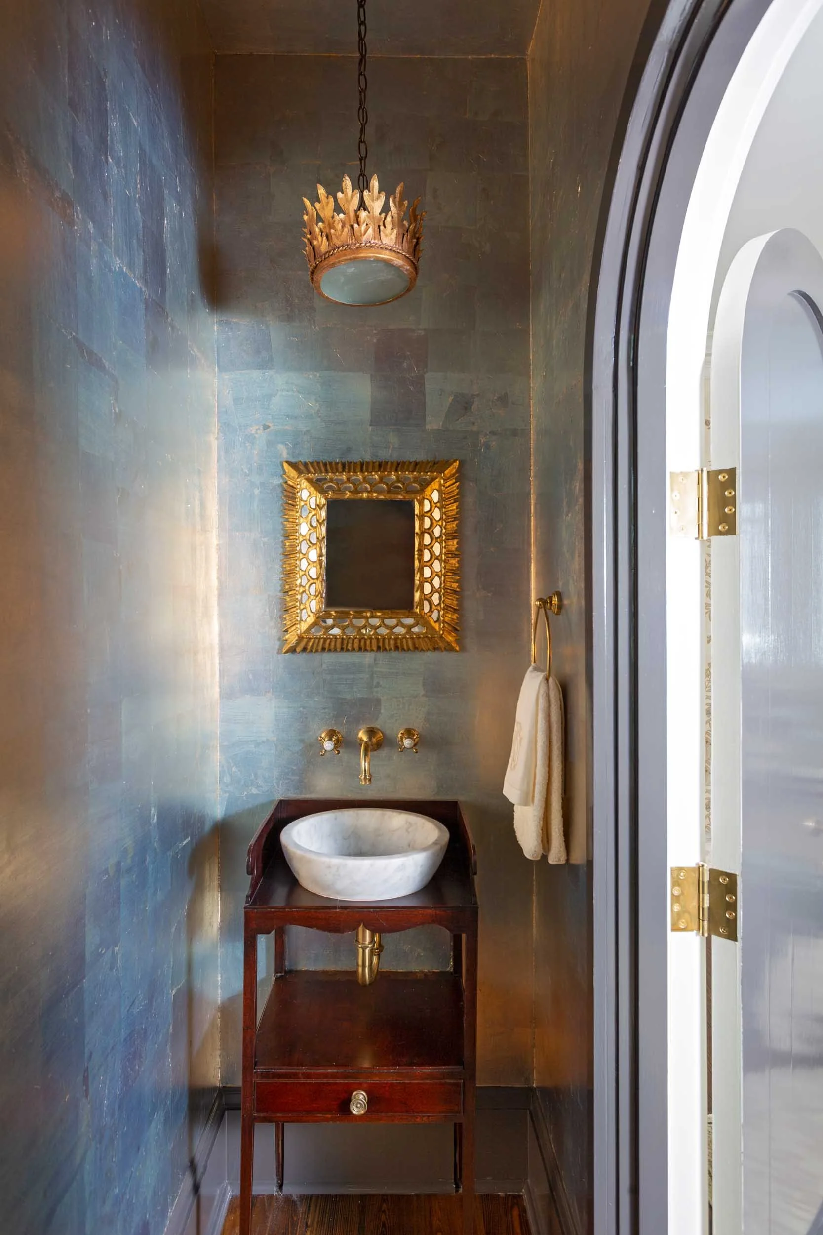 hand-painted-tea-paper-walled-powder-room-with-antique-table-wash-basin.jpg