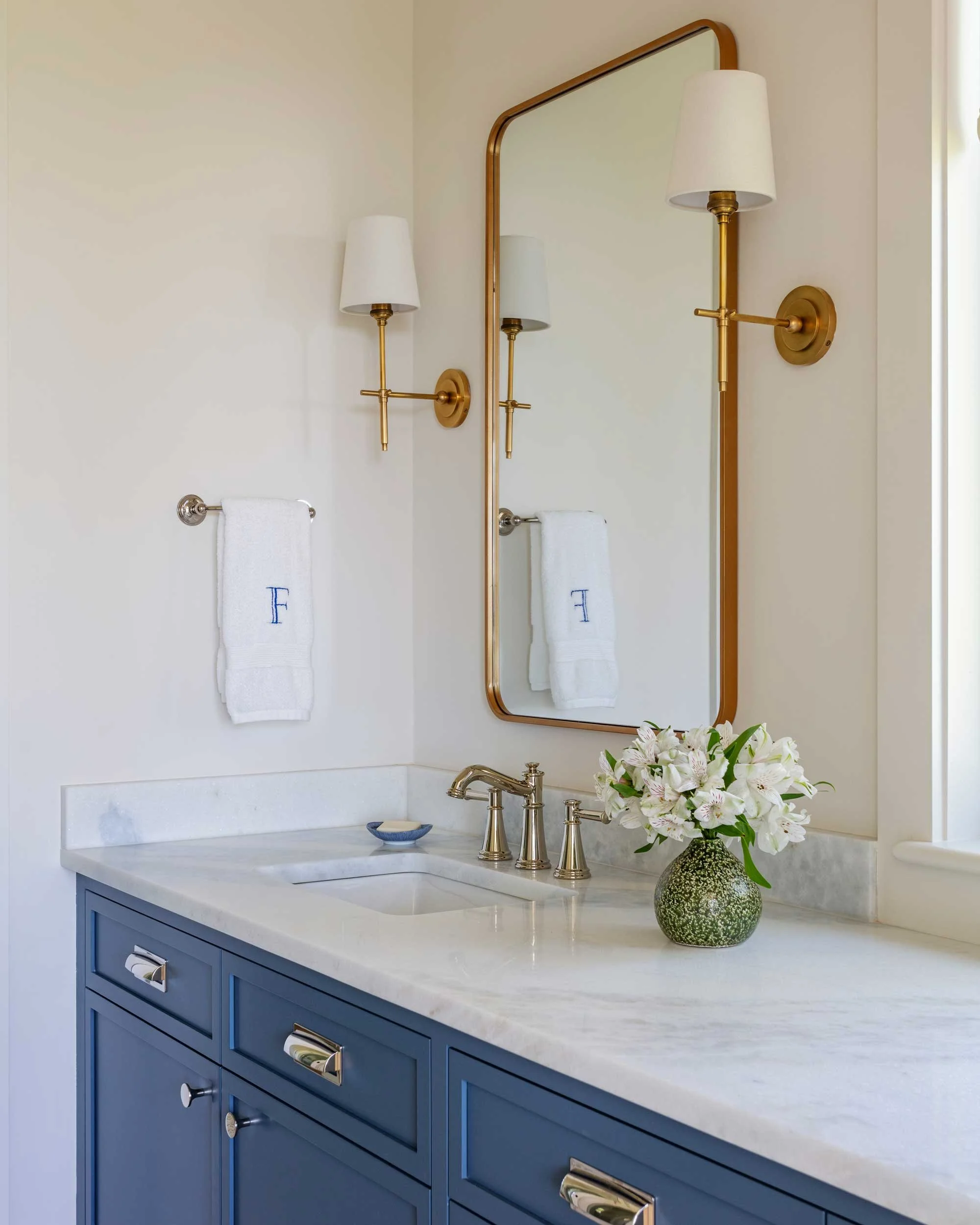 guest-bath-navy-vanity-namib-white-marrble-countertop.jpg