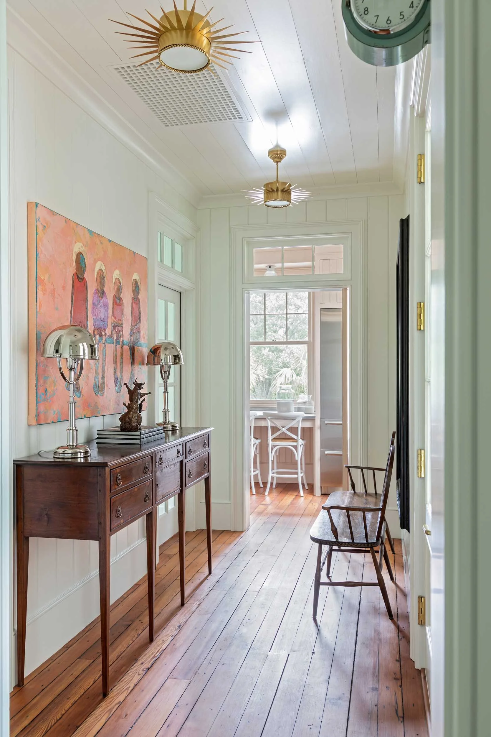hallway-antique-sideboard-bench-vintage-light-fixtures.jpg