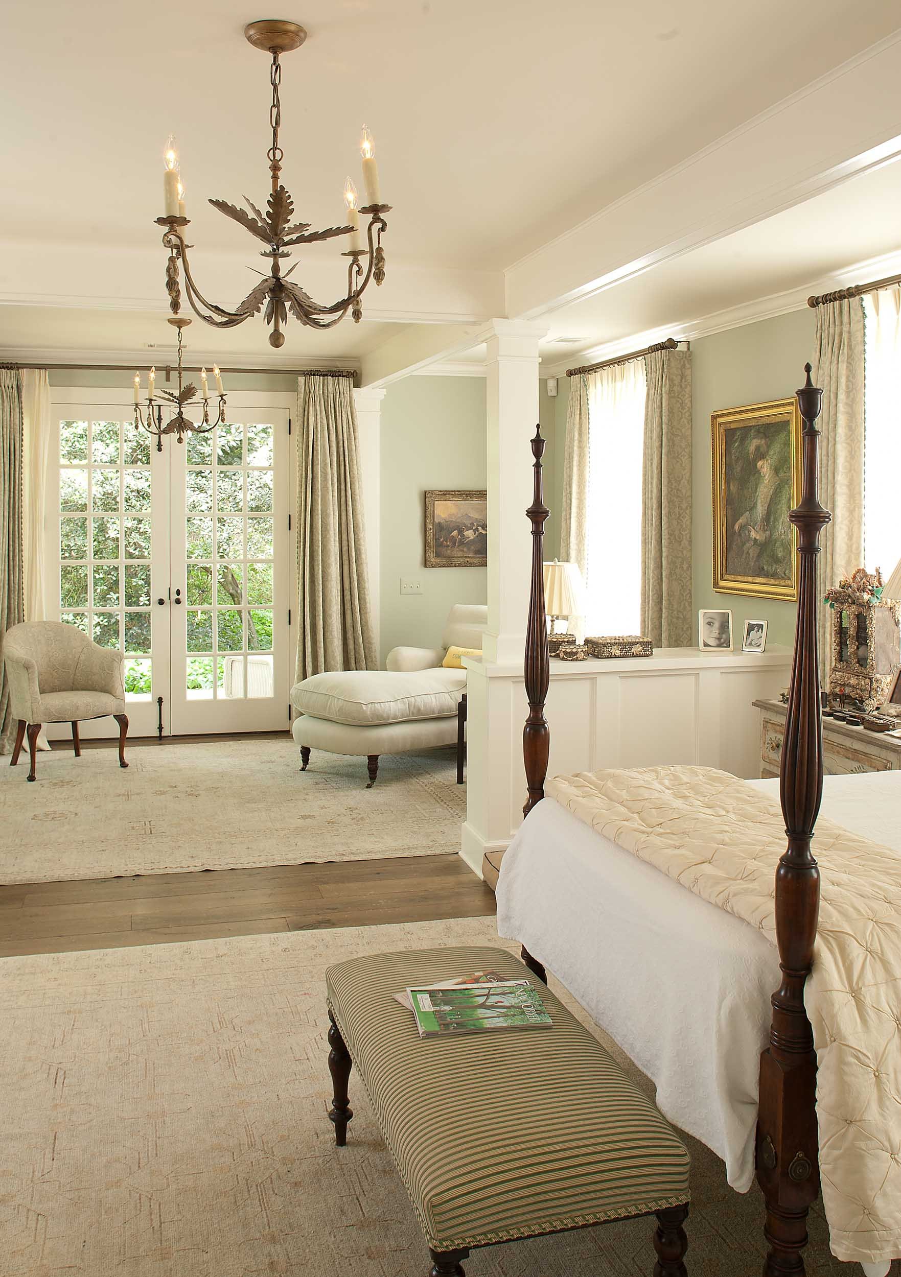 master-bedroom-with-cozy-seating-area-and-antique-chandelier.jpg
