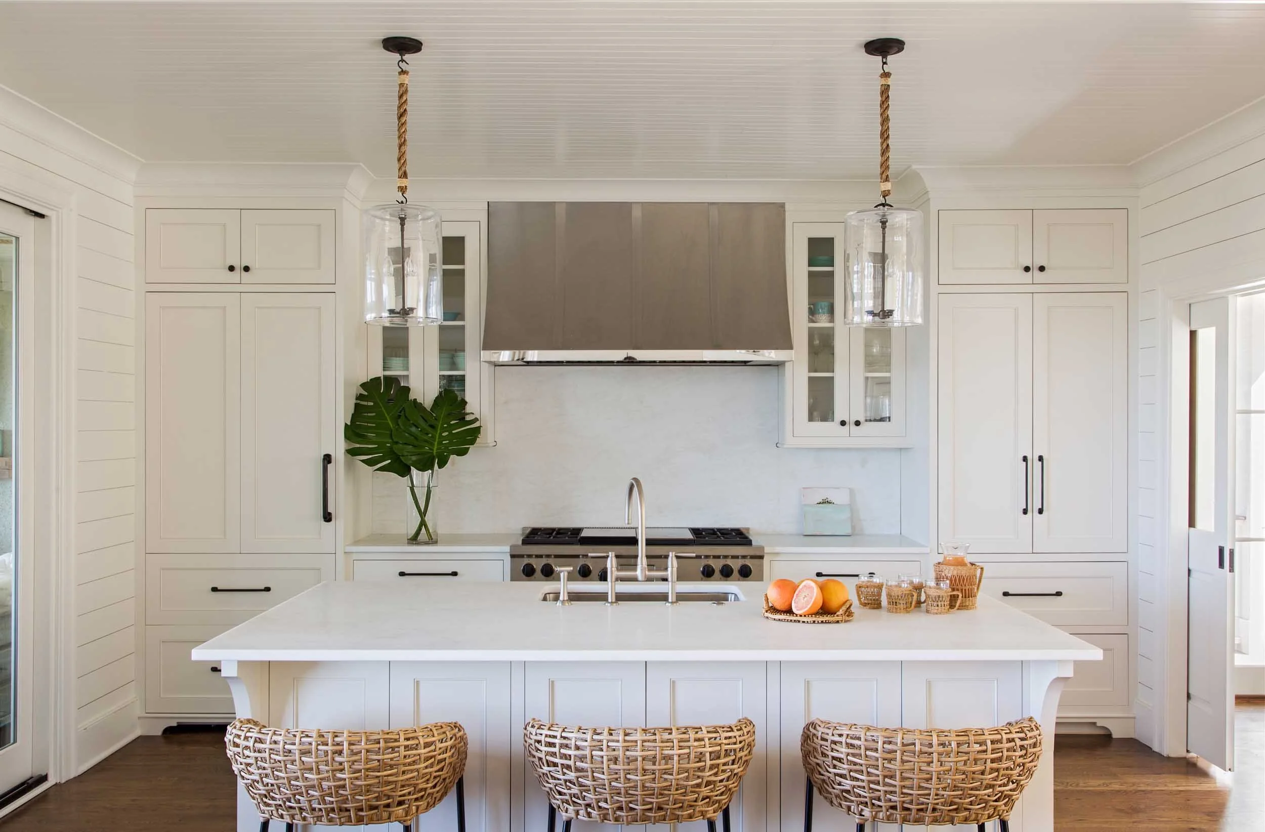 kitchen-white-namib-countertop-hand-blown-glass-pendants.jpg