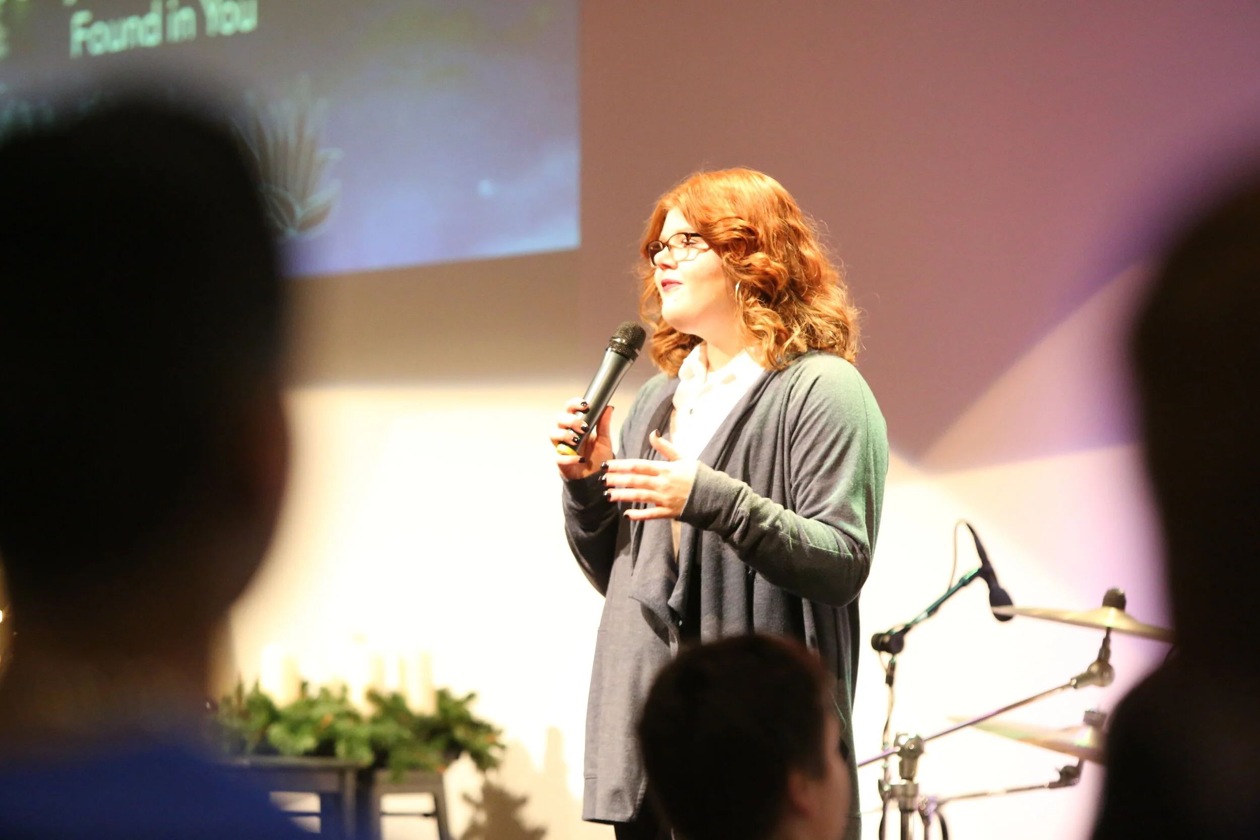 a teacher speaking during chapel at Community of Grace Christian School in White Bear Lake, MN
