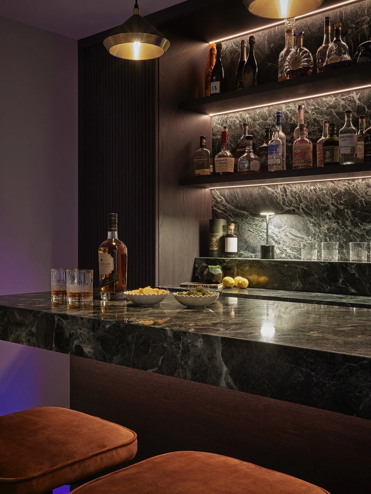 A statement bar perfect for evening drinks! 🍸

With rich green marble, dark-stained oak, and aged brass accents, this home bar delivers warmth, character, and a touch of luxury! 

For all enquiries please contact us on +44(0)1565 746788 or info@pano