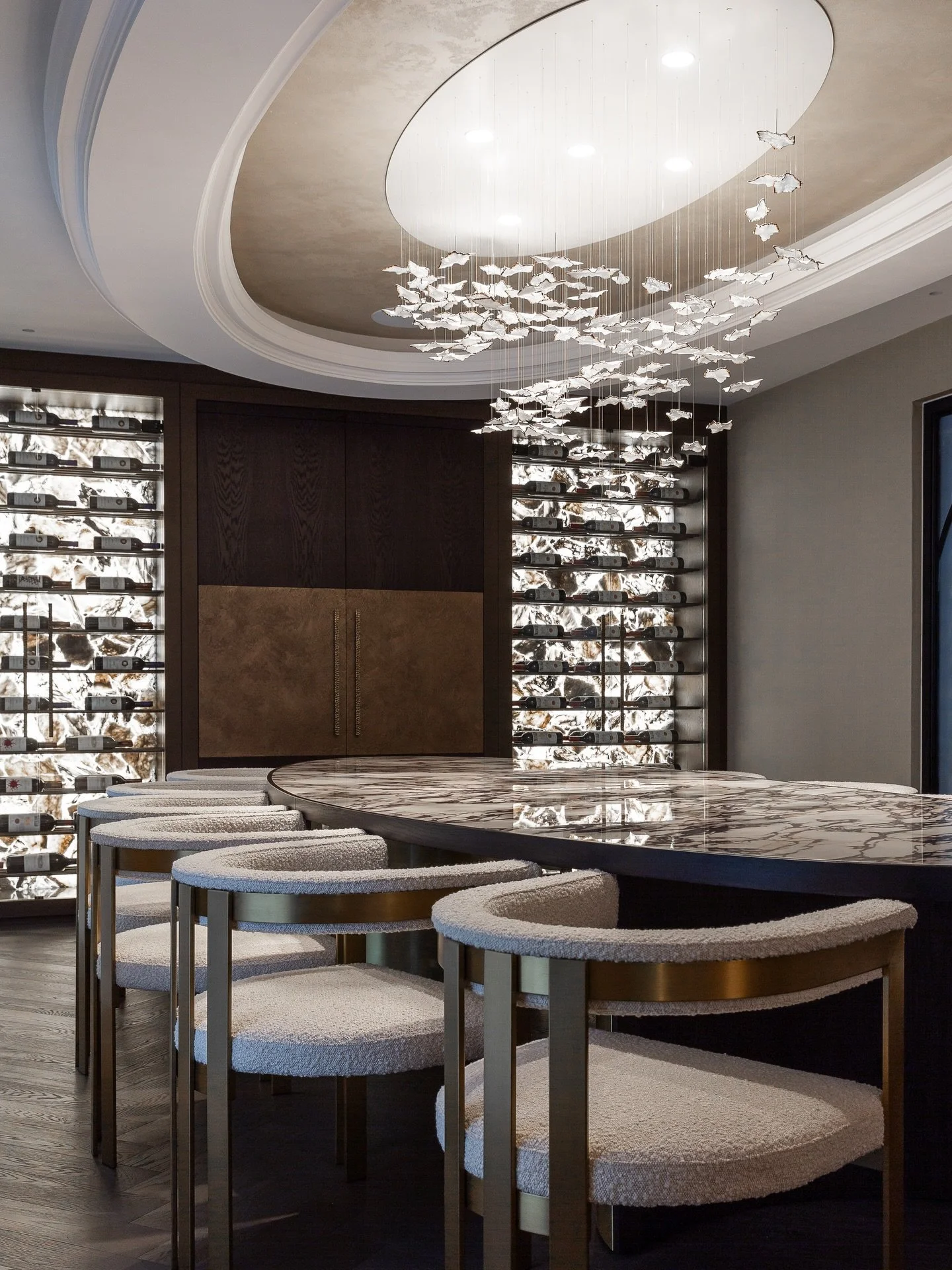 Material richness defines the Dining Area at Holly Mount - glowing quartz, bronzed detailing, and a polished stone table, all brought together beneath a hand-formed ceramic light with a warm metallic sheen. 
A radiant space ✨

For all enquiries pleas