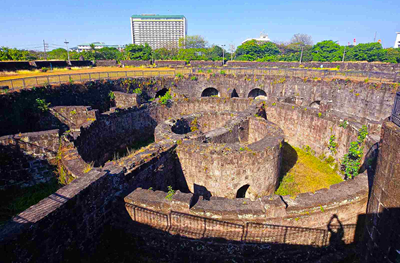 Baluarte de San Diego and Manila Hotel at the background
