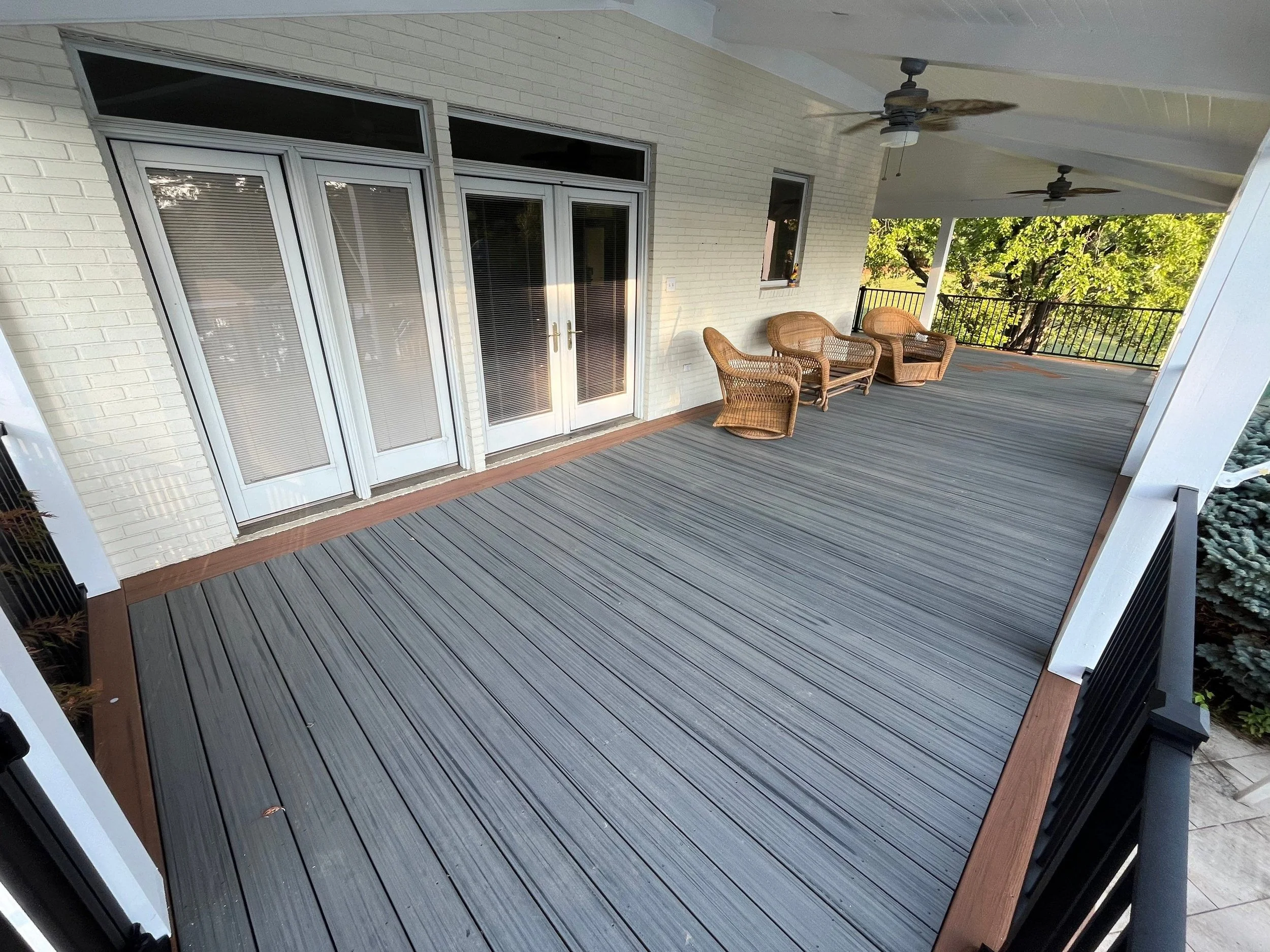 Custom Trex deck with bold orange "T" inlay, designed for a Tennessee fan. This low-maintenance composite deck blends clean lines with personalized detail, perfect for outdoor living in East Tennessee and Western North Carolina