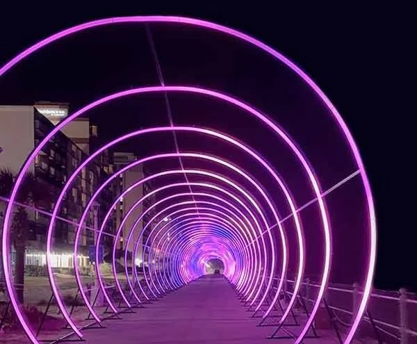 Curved HDPE commercial holiday light show tunnel engineered in the USA by Mega Light Show