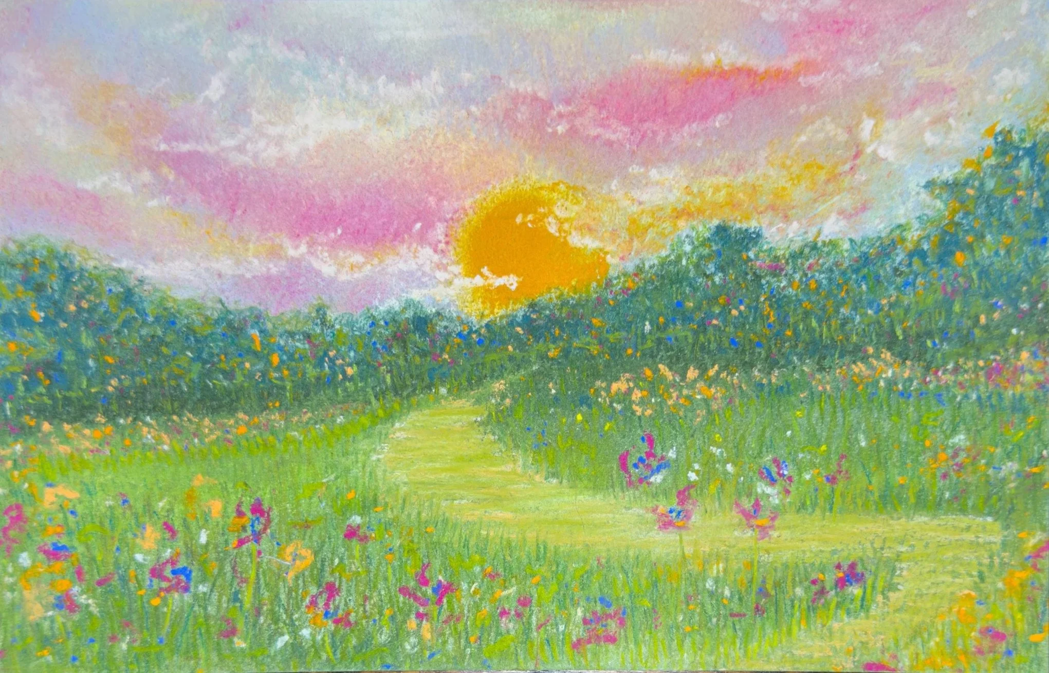 A colorful soft pastel, impressionist-style landscape painting of a grassy field with hills and wildflowers under a sky with pink, orange, and yellow clouds, and the sun setting in the background.