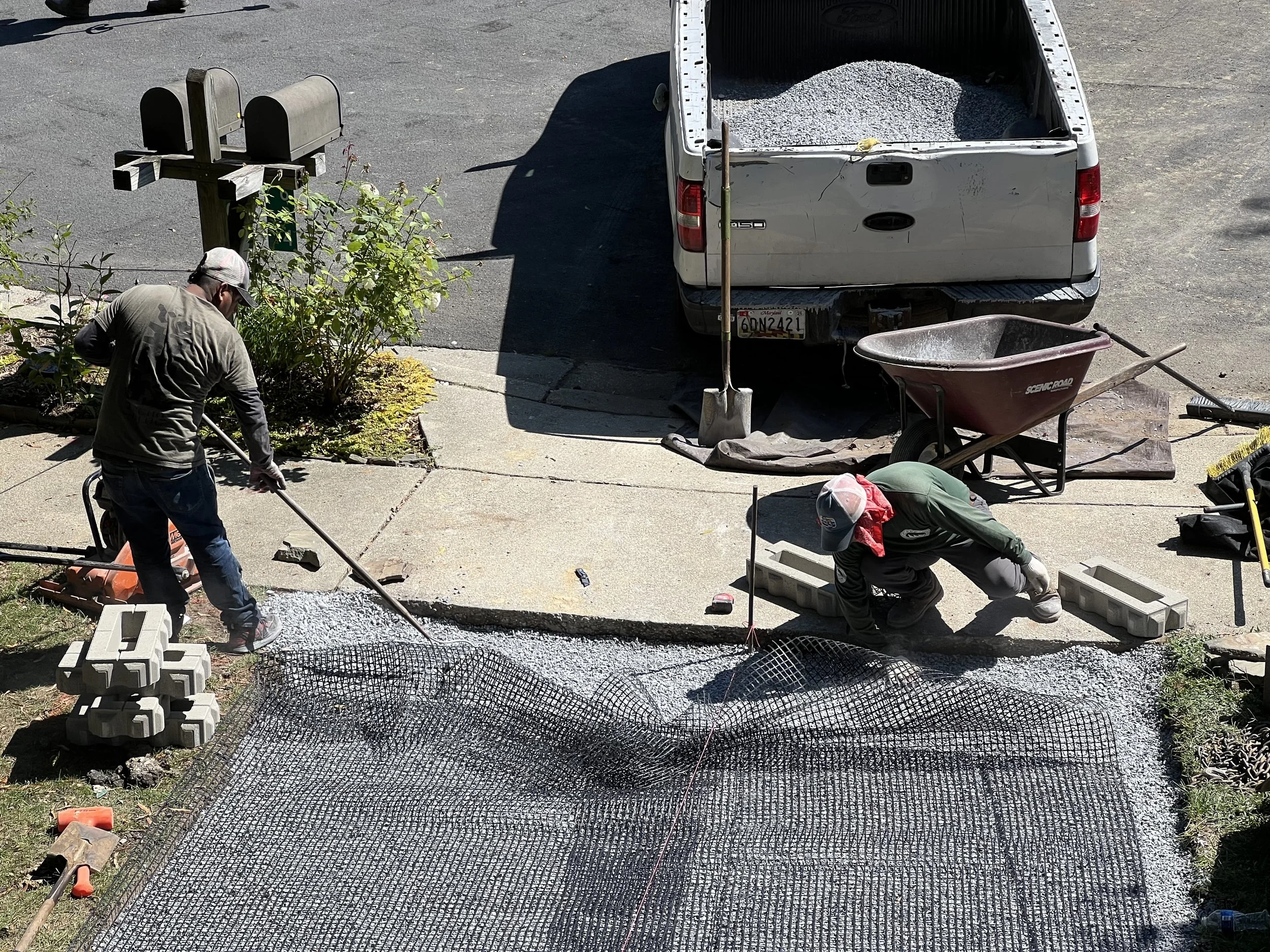  The pavers are 3.5 inches thick and extra care is required to get the slope right and the new driveway level with the existing sidewalk.
