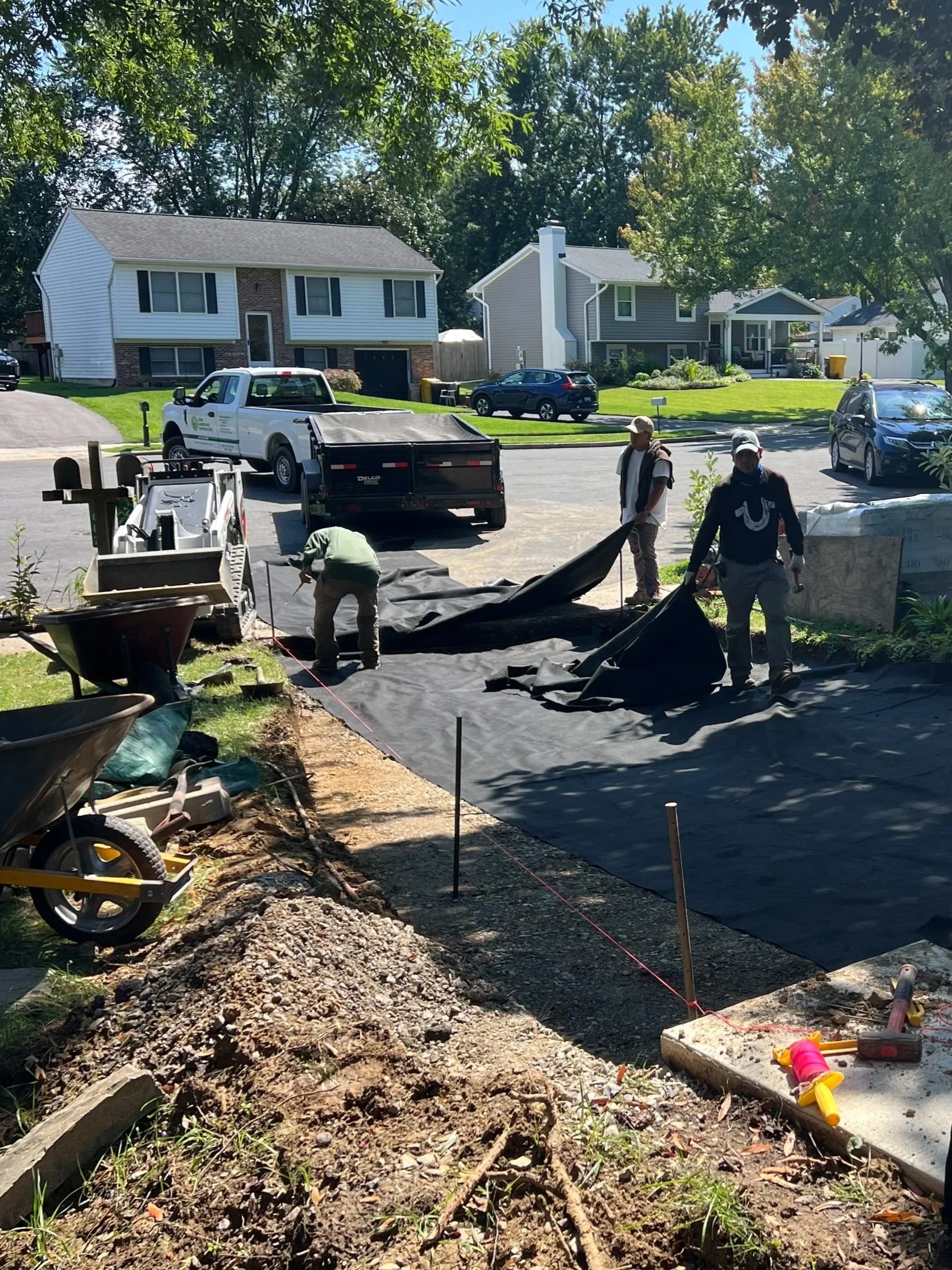 The first layer of geofabric goes down!
I hired Cape Landscape Contractors, LLC to install.  Click this photo to view their services. 