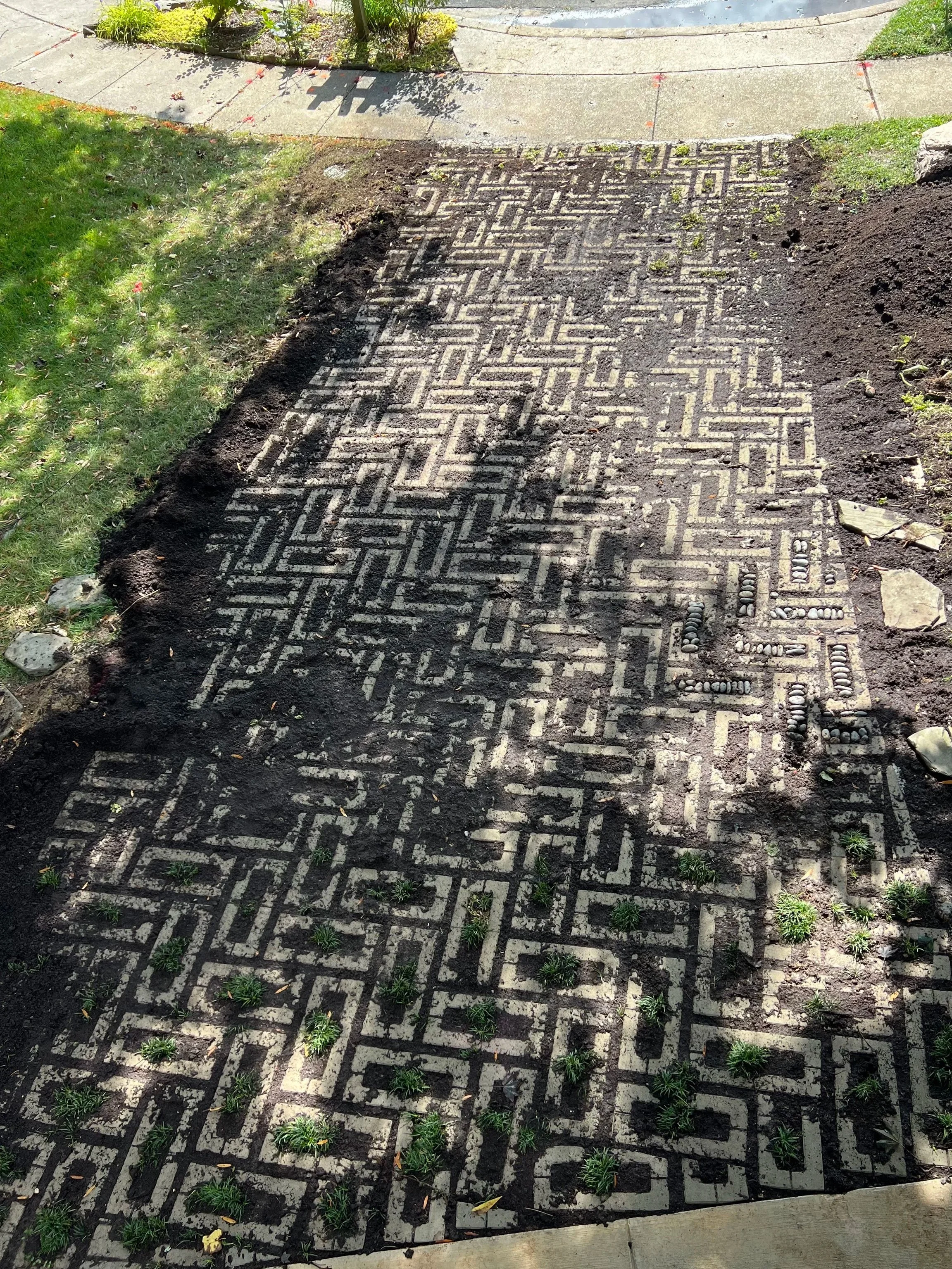 The driveway is a mess for about 2 weeks as the soil settles.  This is NOT the fun part.