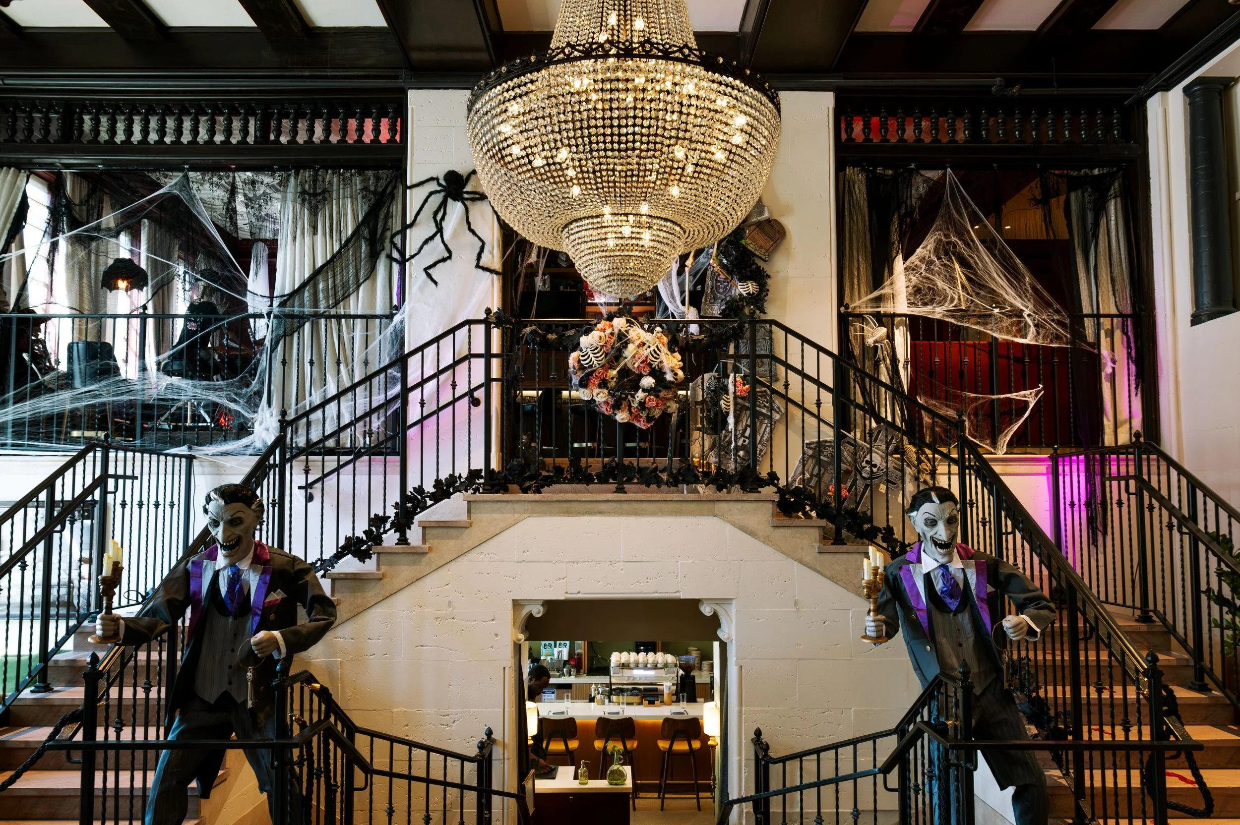 hall decorated with Halloween decor