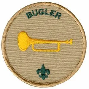 A circular embroidered patch with a beige background, featuring the word 'BUGLER' at the top, a yellow bugle in the center, and a green fleur-de-lis symbol at the bottom.