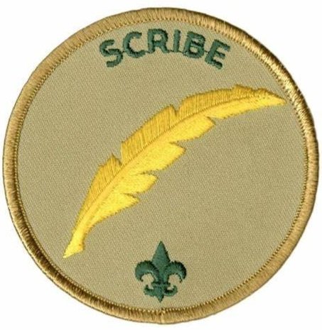 A circular embroidered patch with the word 'SCRIBE' at the top, a yellow feather in the center, and a small green fleur-de-lis symbol at the bottom.