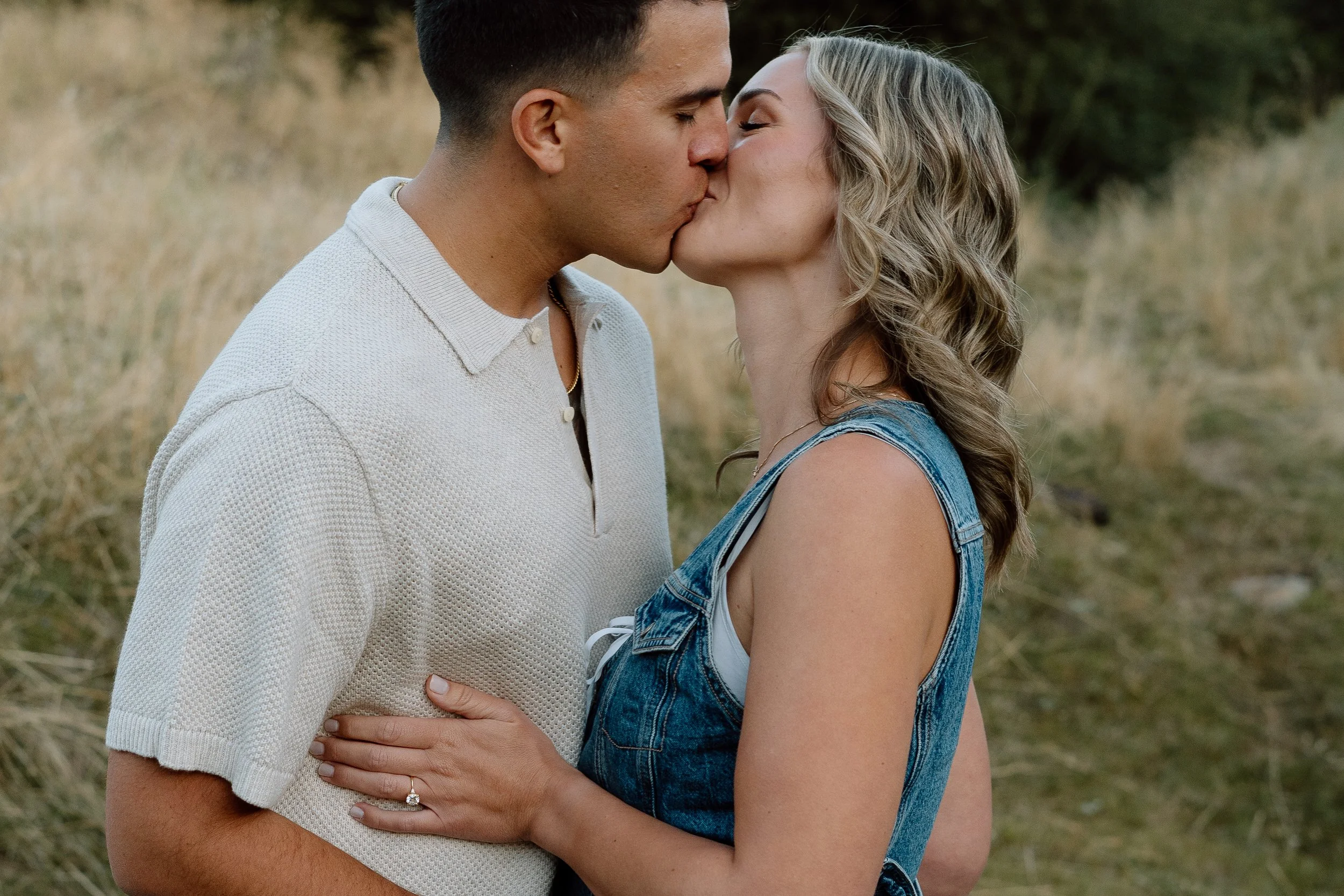 engaged-couple-kissing.jpg