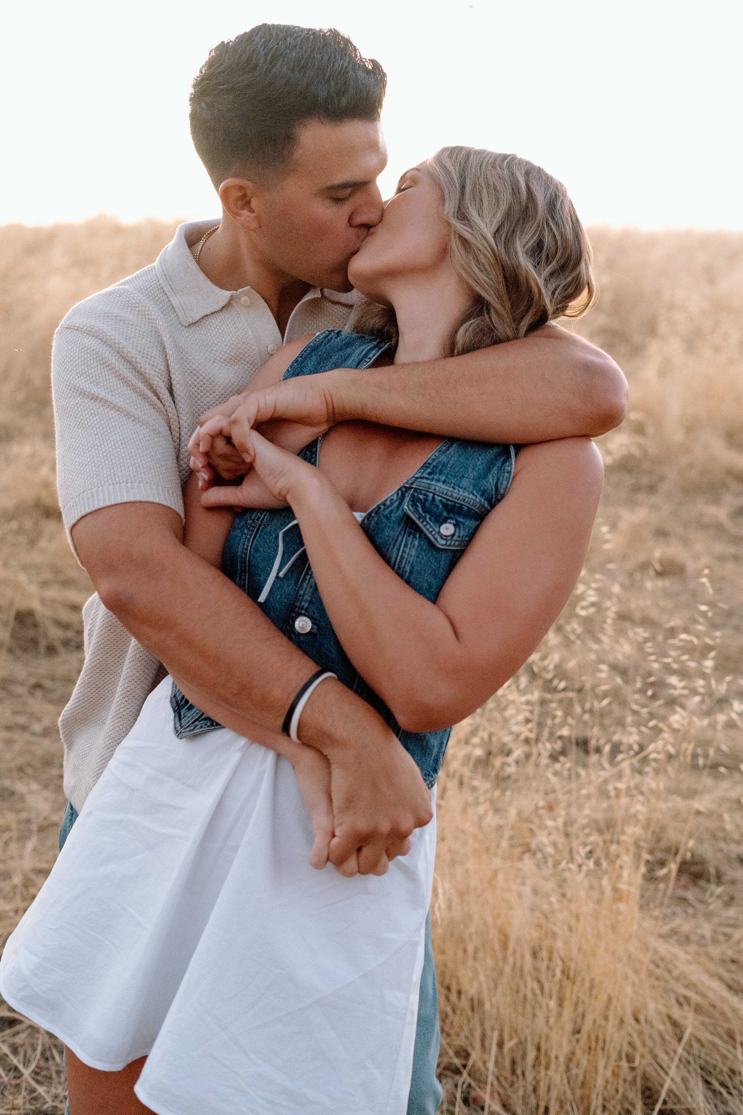 engaged-couple-kissing-in- Julian-California.jpg