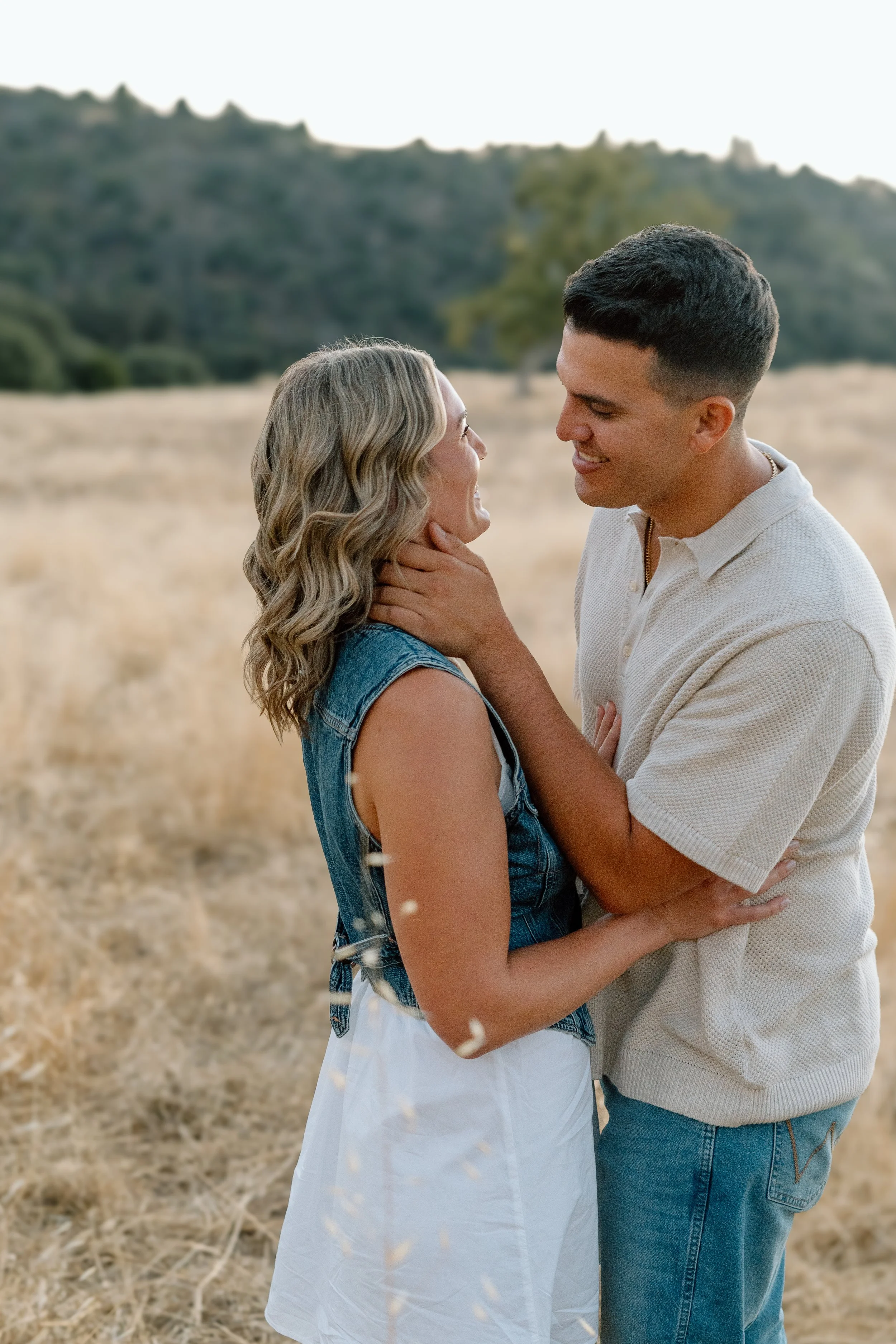 engaged-couple-leaning-in-to-kiss.jpg