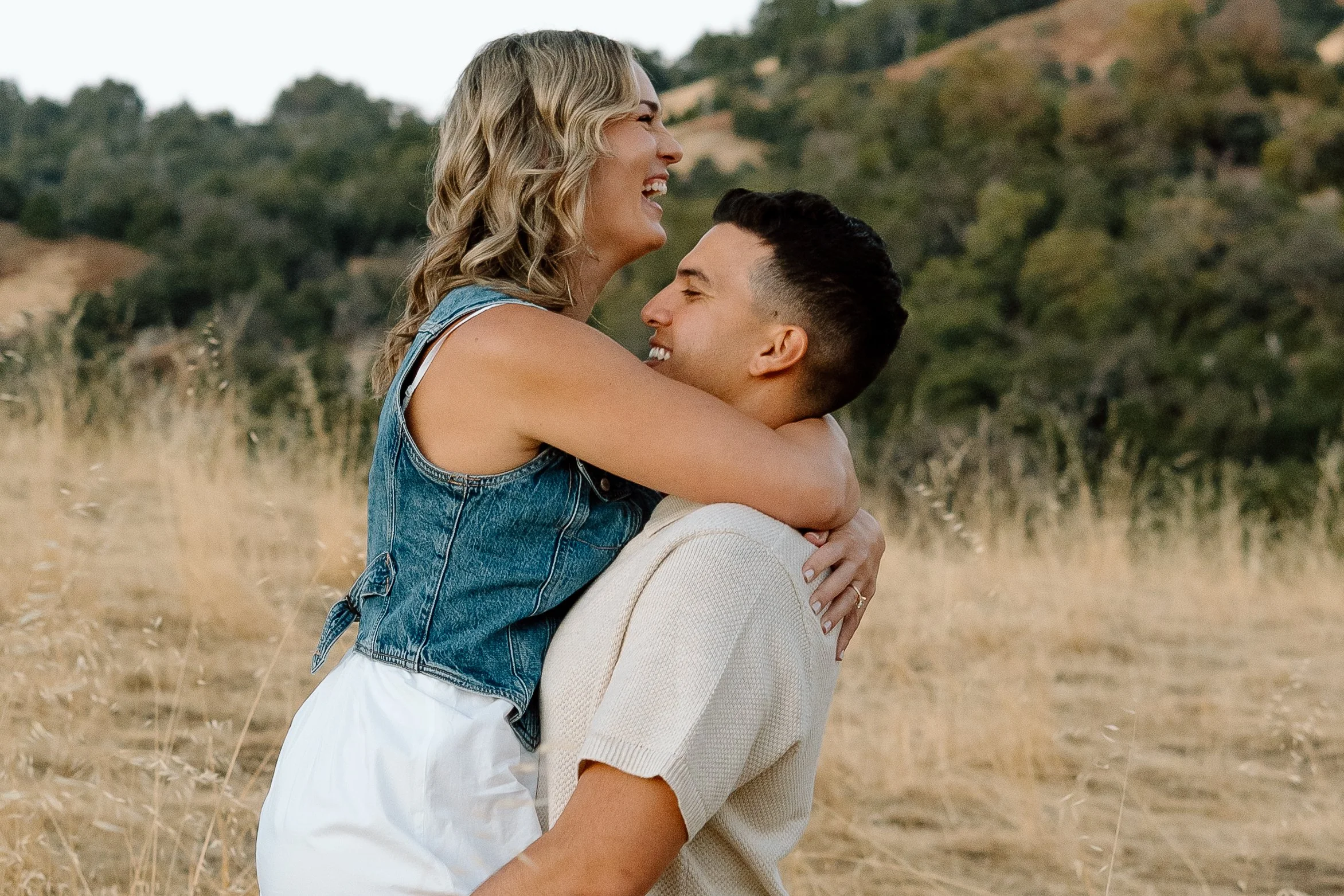 man-holding-girl-up-laughing-julian-california.jpg