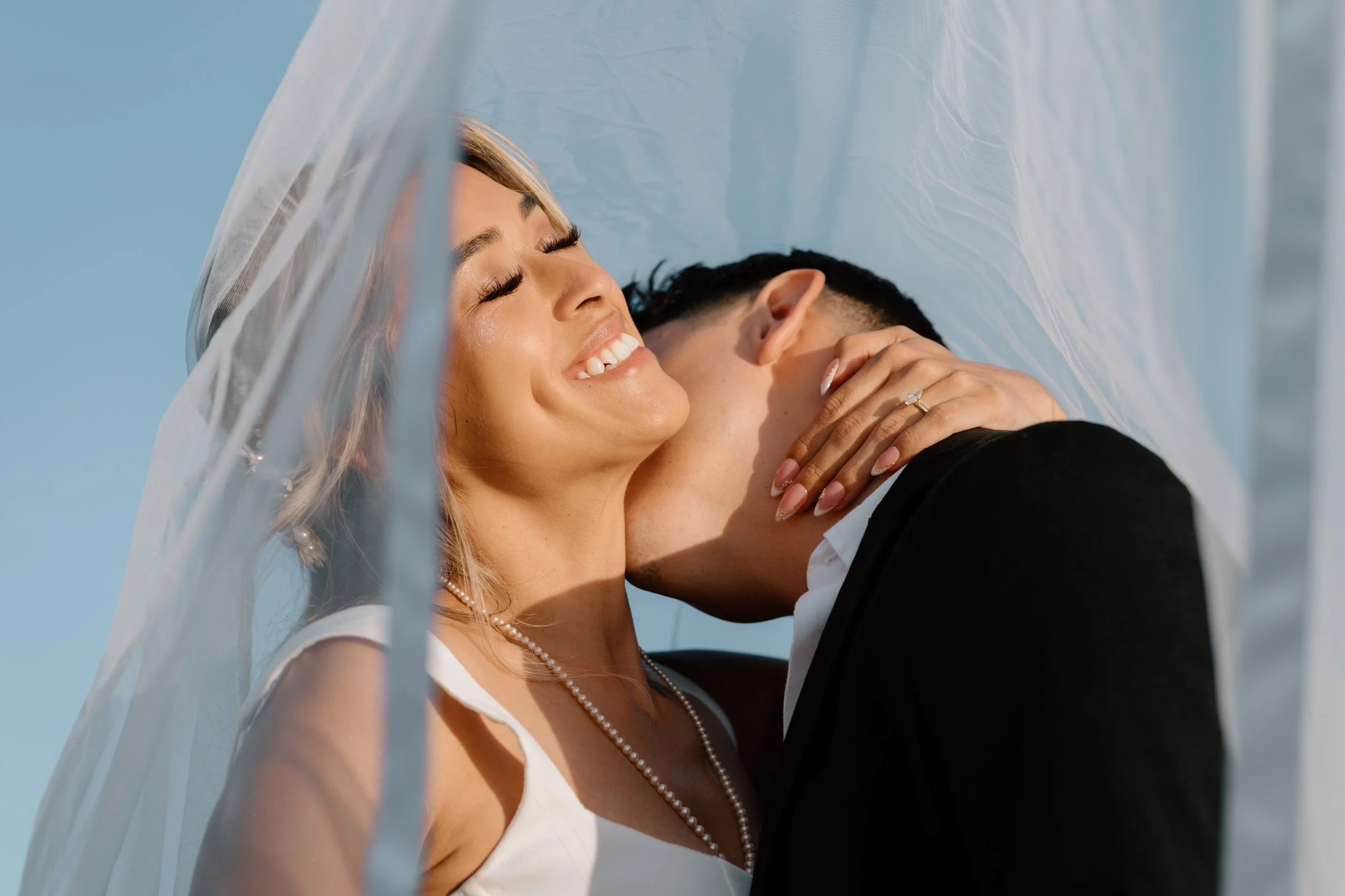 Bride-and-Groom-Under-Veil-5.jpg