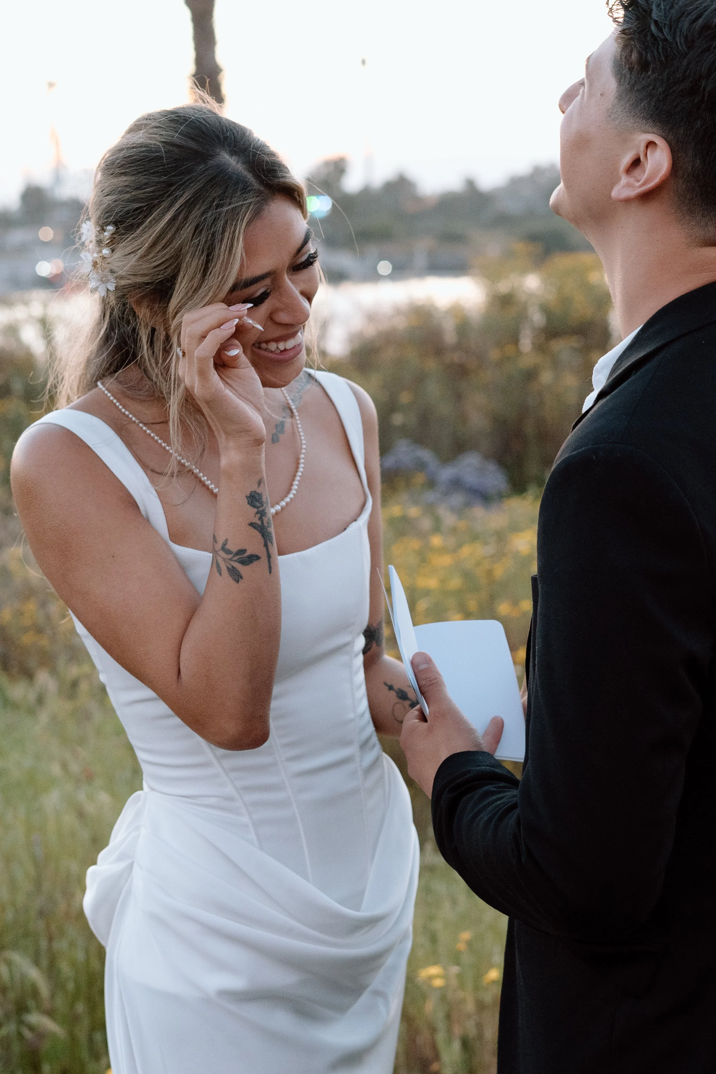 bride-laughing-at-grooms-vows.jpg