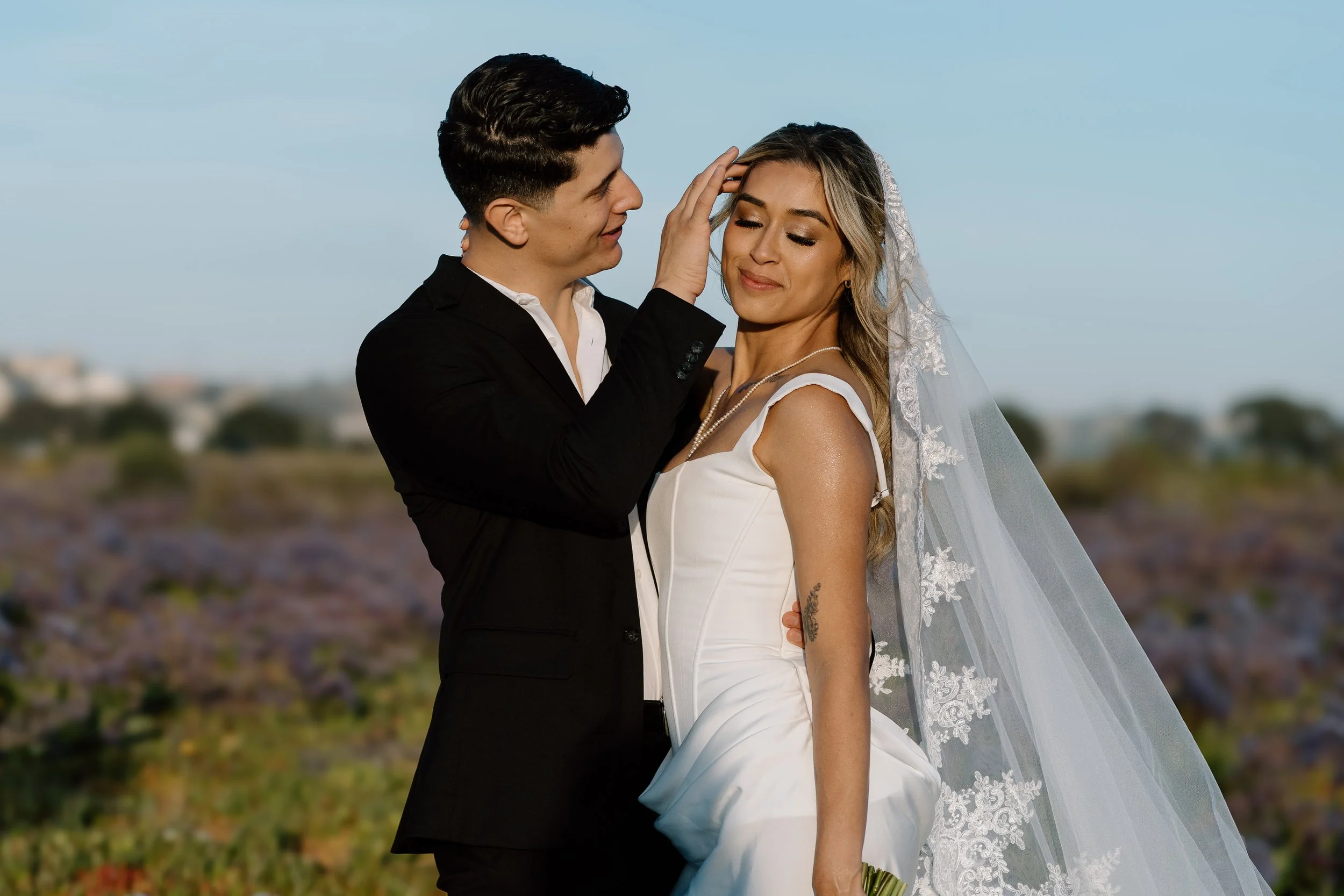 Groom-brushing-brides-hair.jpg