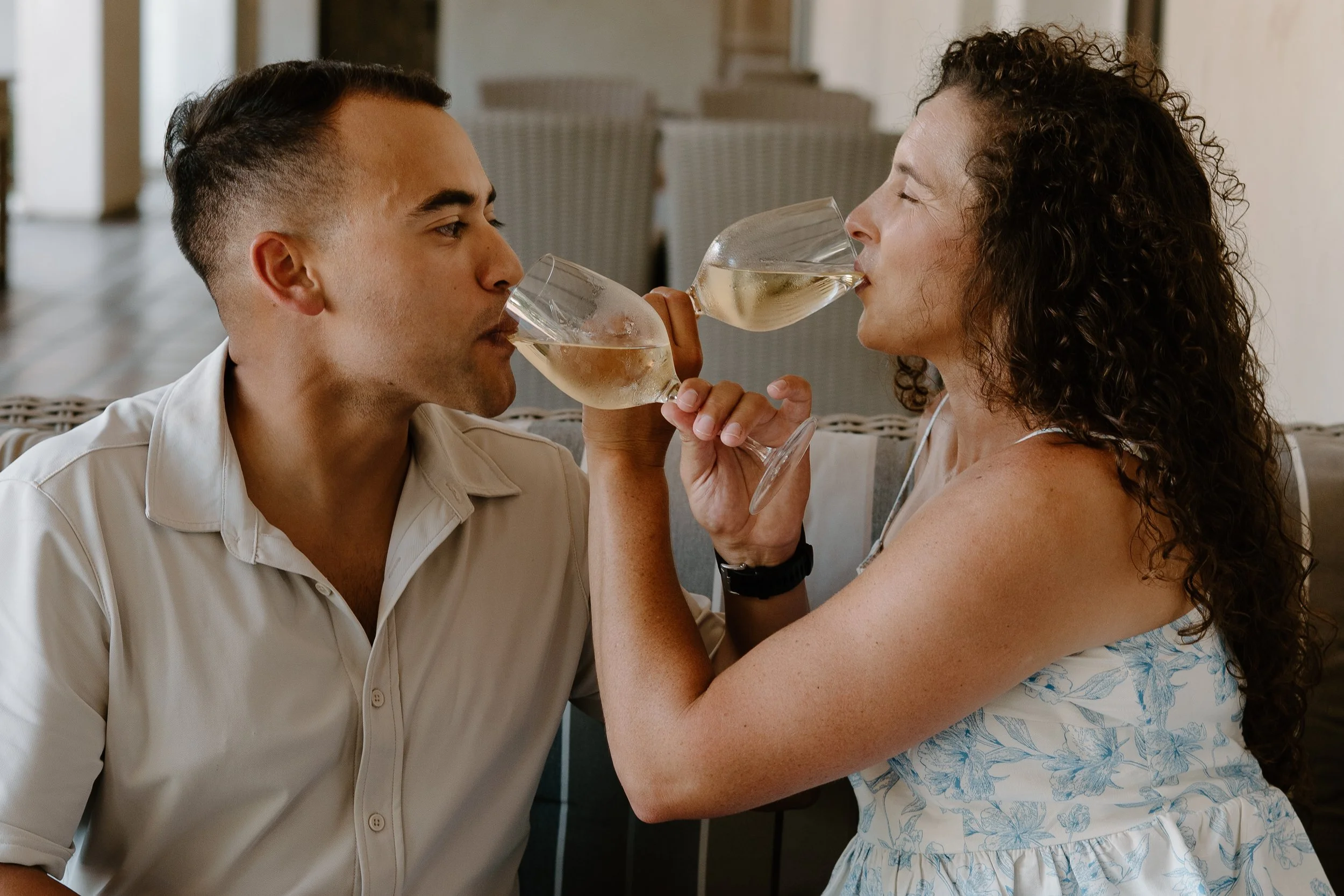temecula-ponte-winery-engaged-couple-drinking-wine.jpg