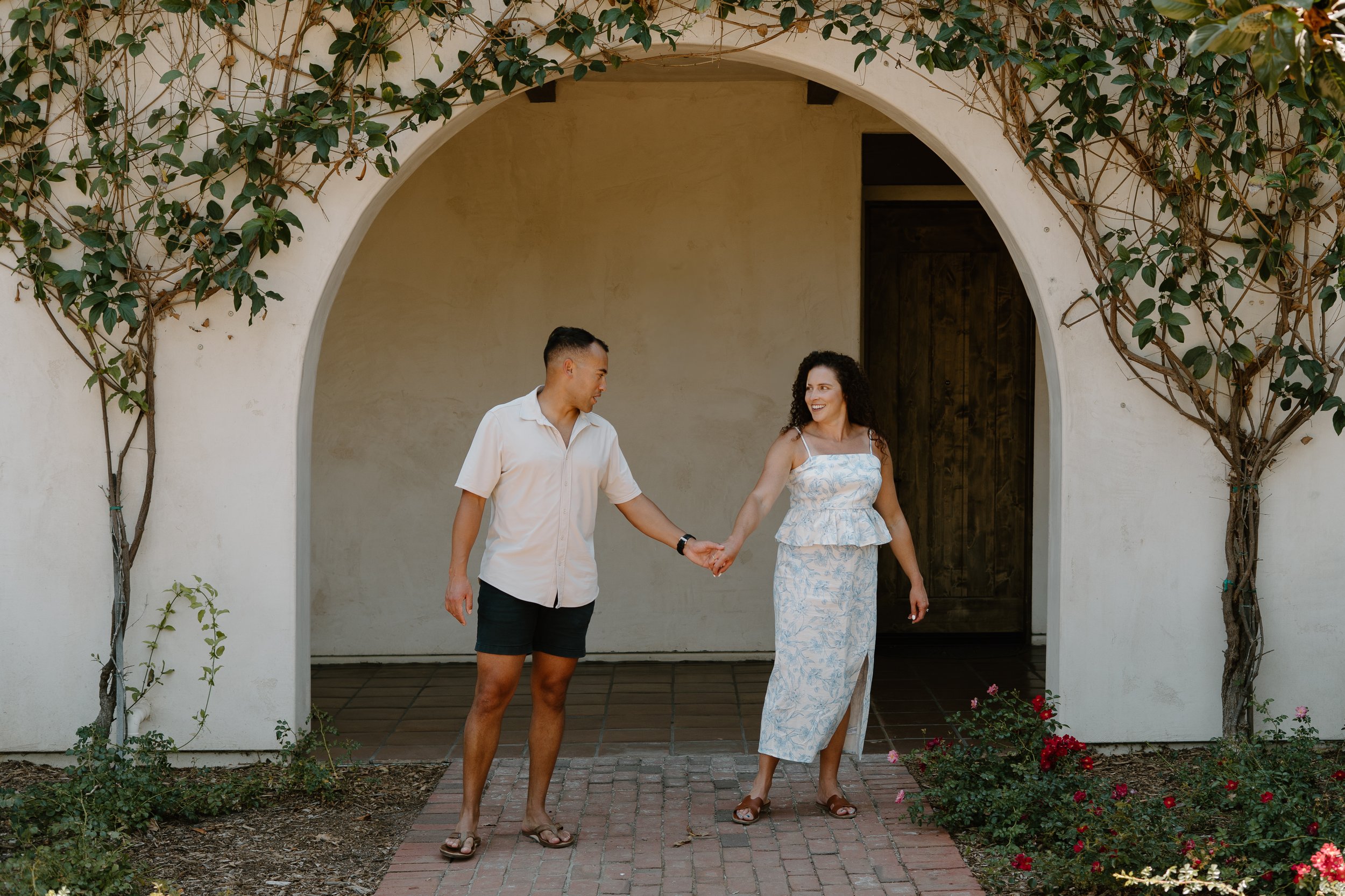 couple-walking-holding-hand-temecula-winery.jpg