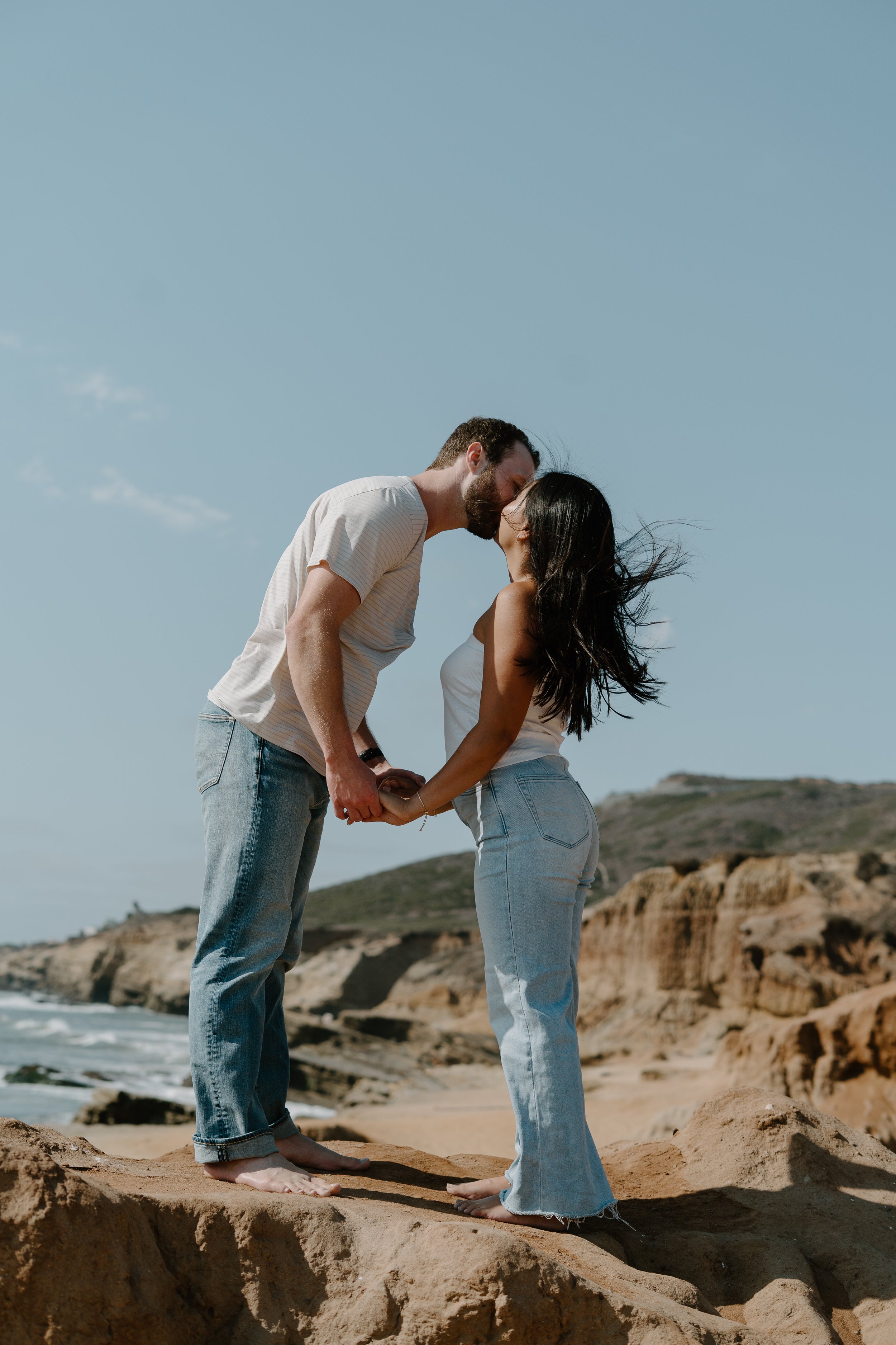 couple-kissing-on-cliff-la-jolla.jpg