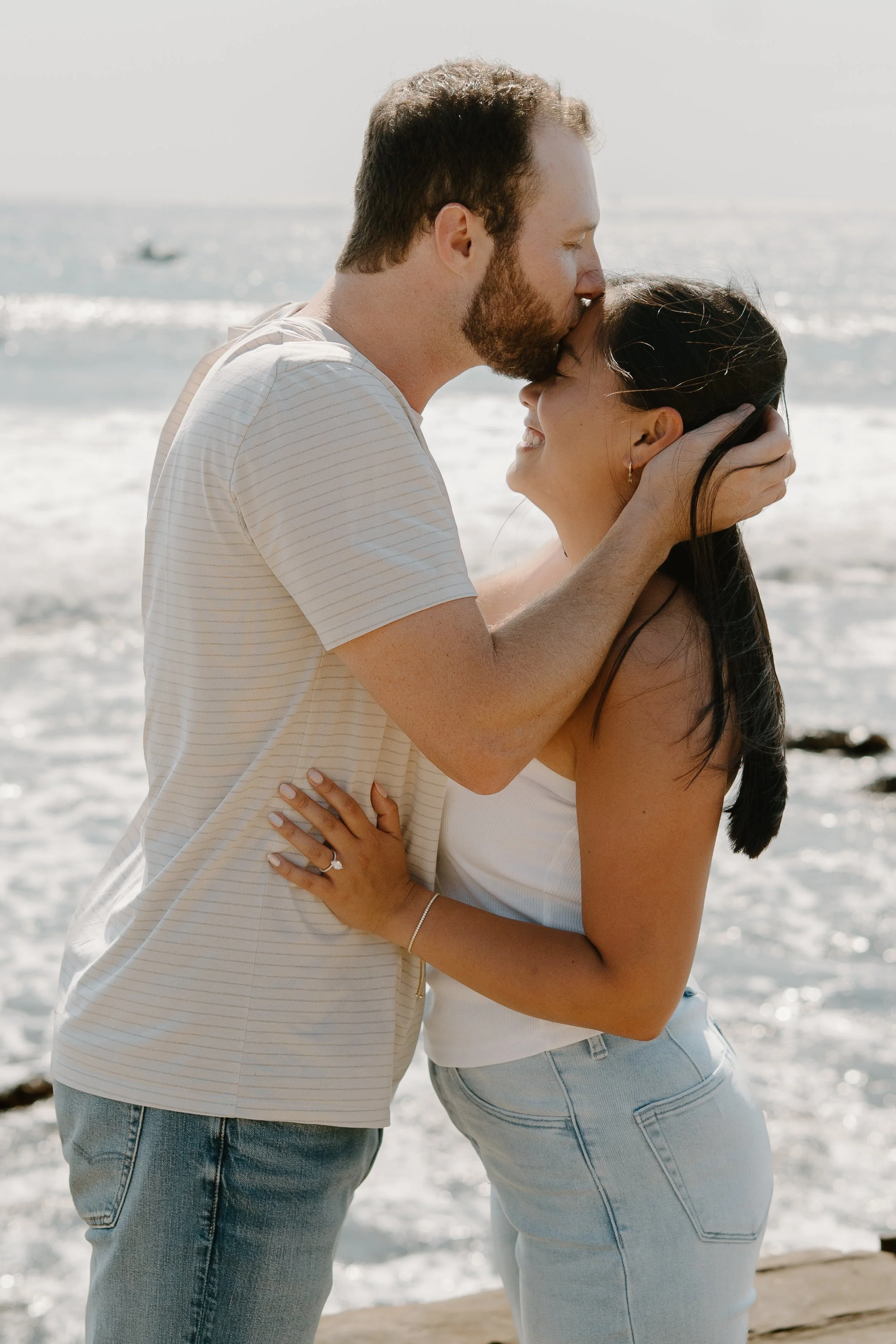 man-kissing-fiances-forehead.jpg