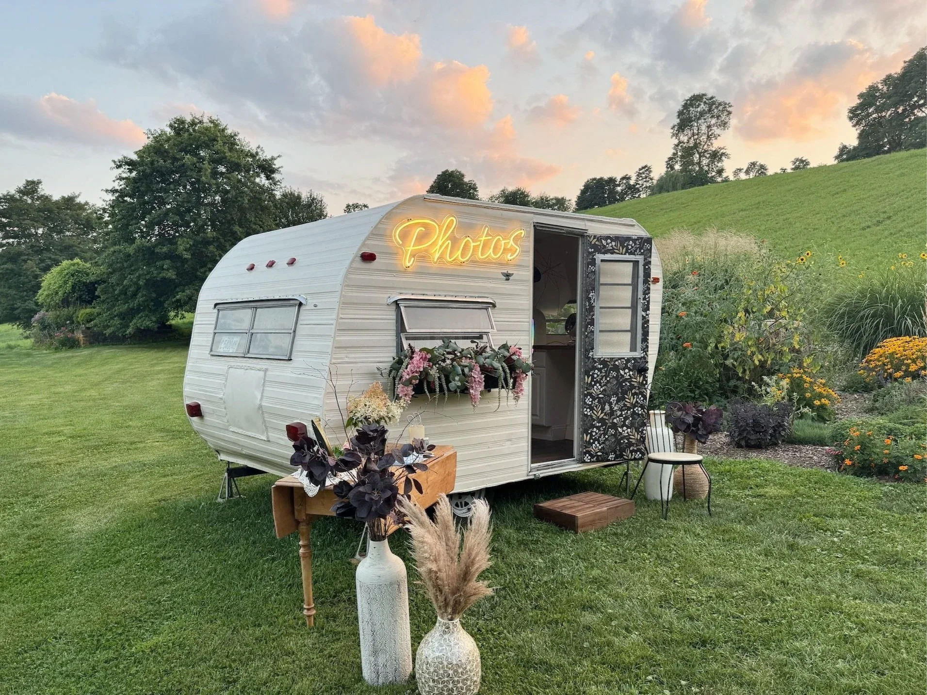 Vintage mobile photo booth camper at an outdoor wedding in Hudson Valley, New York, Red Maple Vineyard