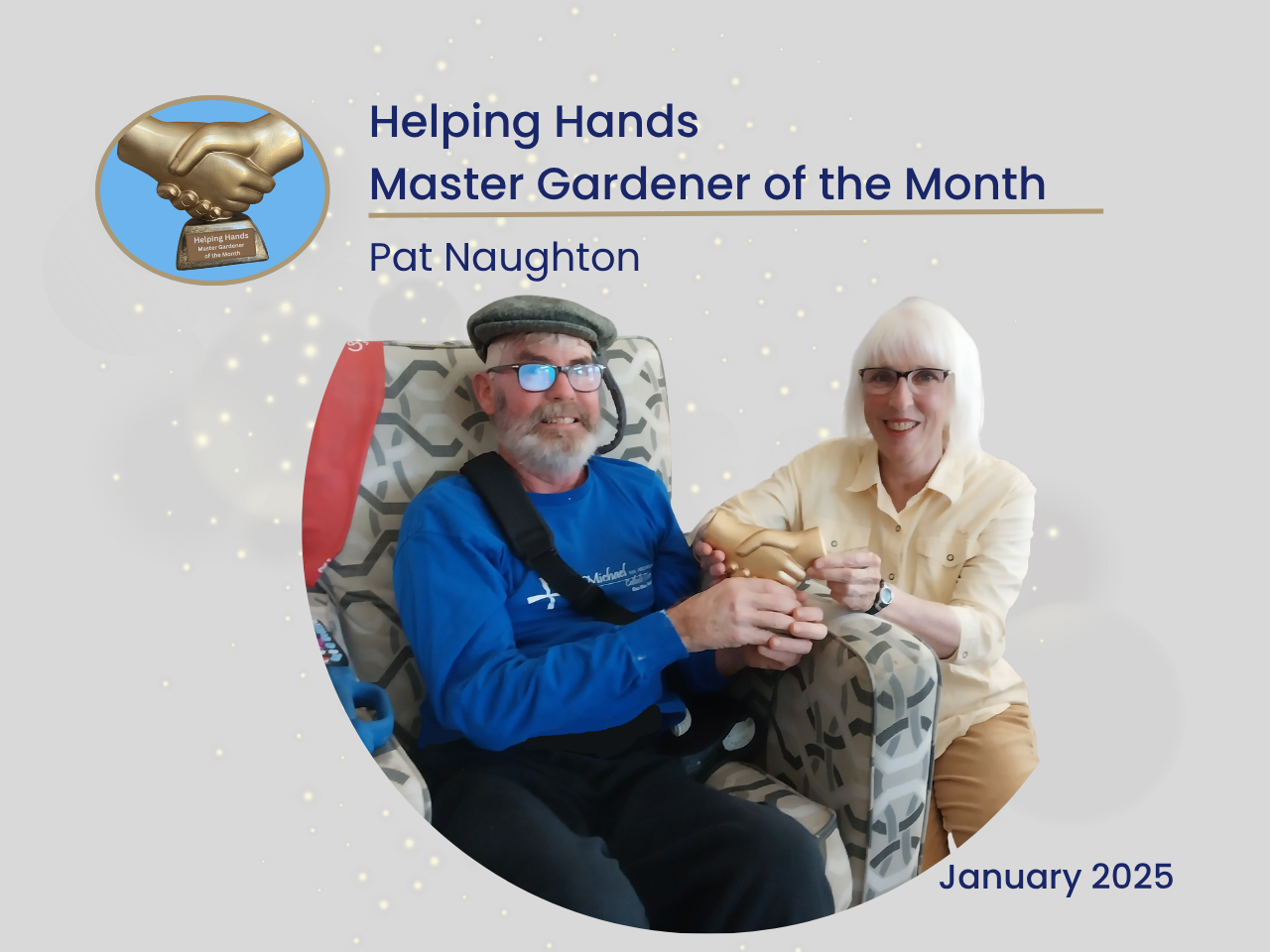 Pat and Michelle holding the Helping Hands Award