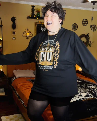 Dean in their home, advertising another outfit from their Letter Shoppe store.