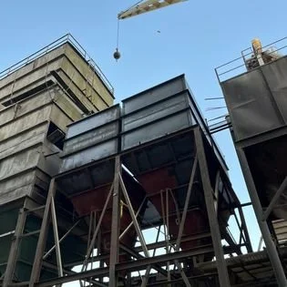 Large shop fabricated feed bins and on site repaired funnels. With full installation and shipping