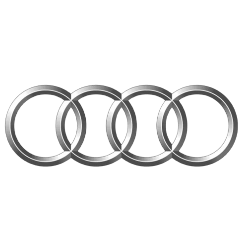 Close-up of the Audi logo with four interlinked silver rings on a black background.